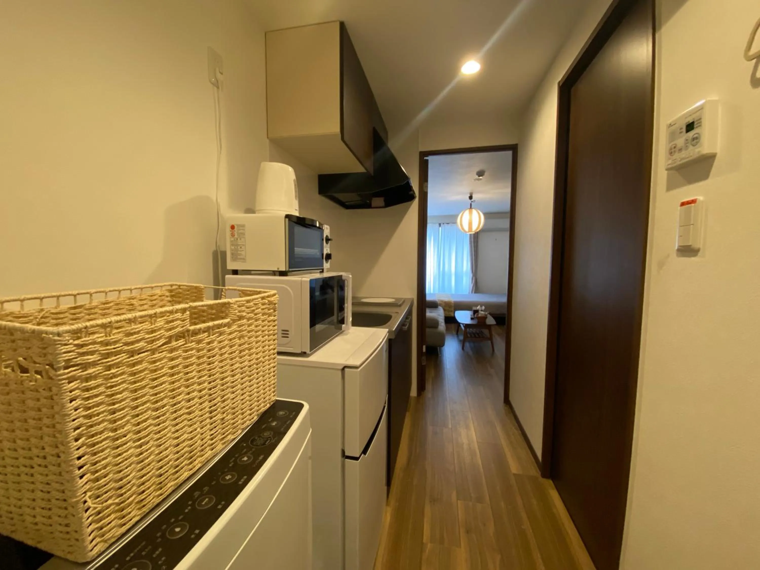 Kitchen or kitchenette in Apartment Hotel KANSO