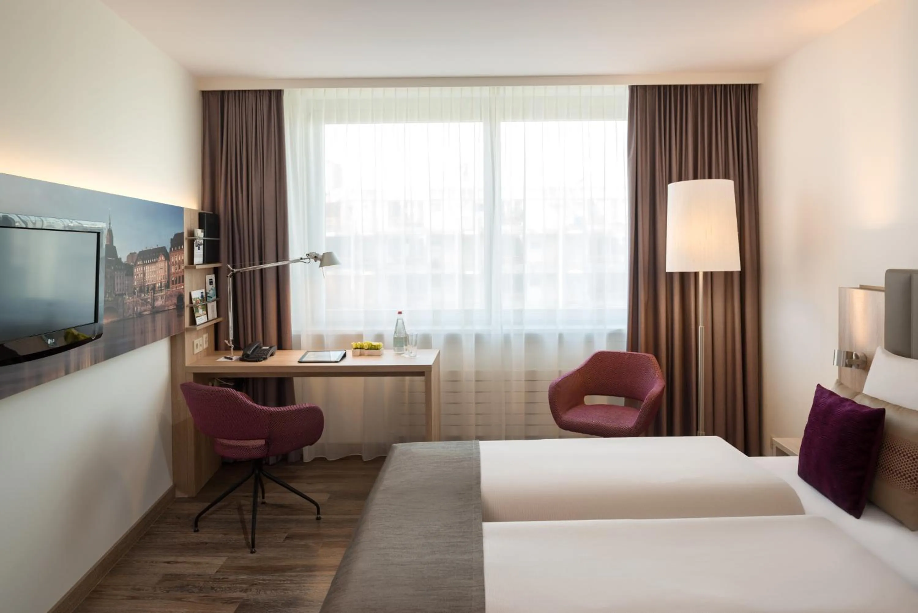 Photo of the whole room, Bed in Essential by Dorint Basel City