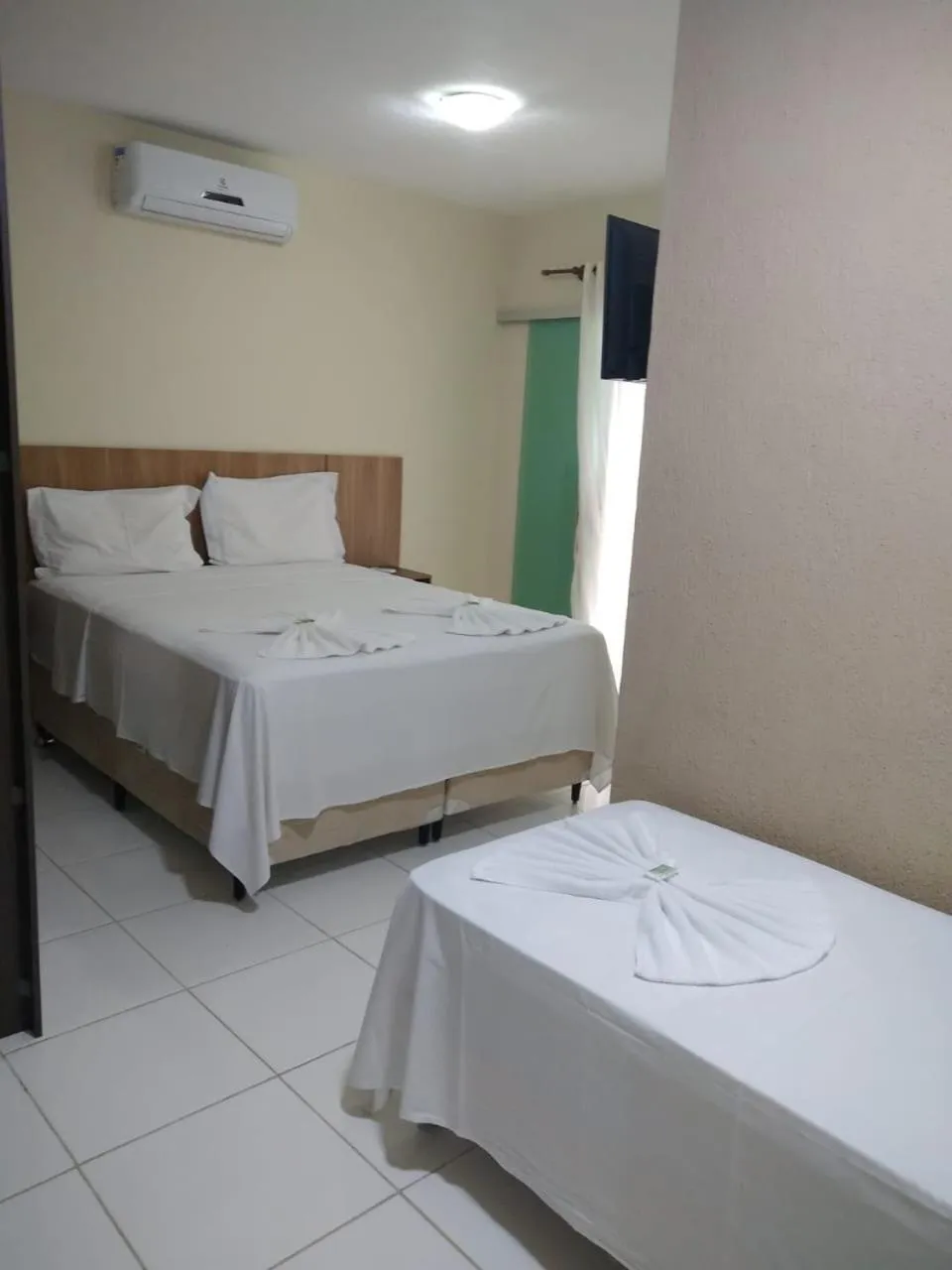 Bed in HOTEL PRAIA DA PAIXÃO