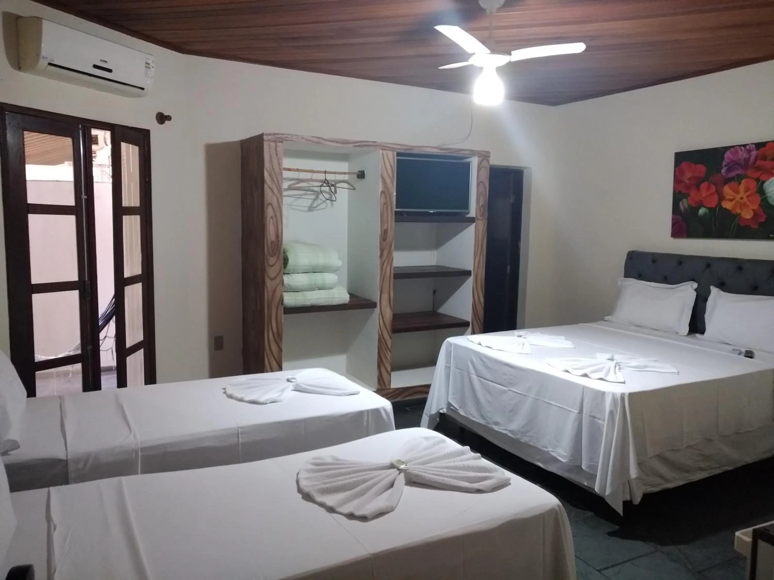 Bed in HOTEL PRAIA DA PAIXÃO