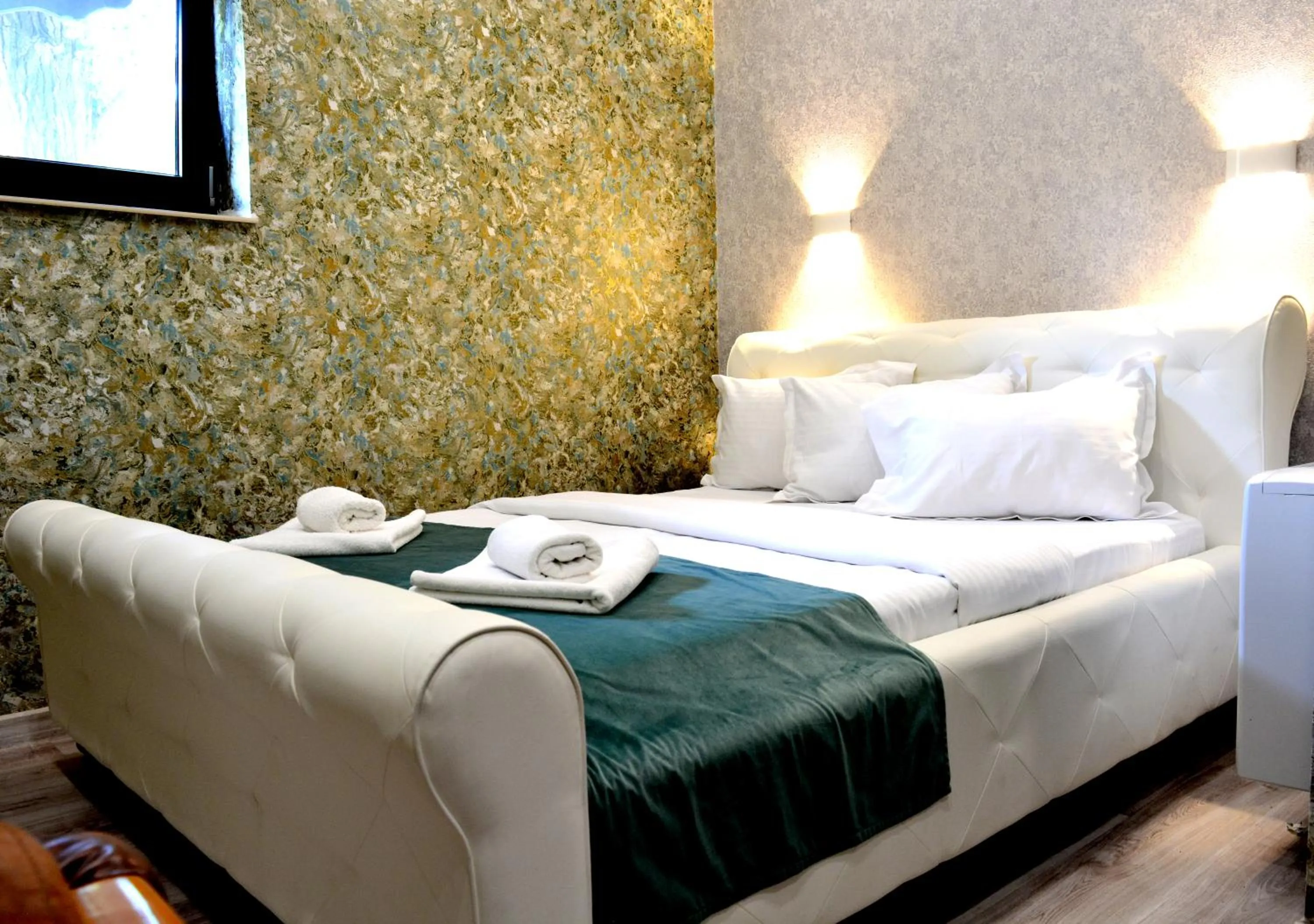 Bed in Arizet Boutique Mamaia