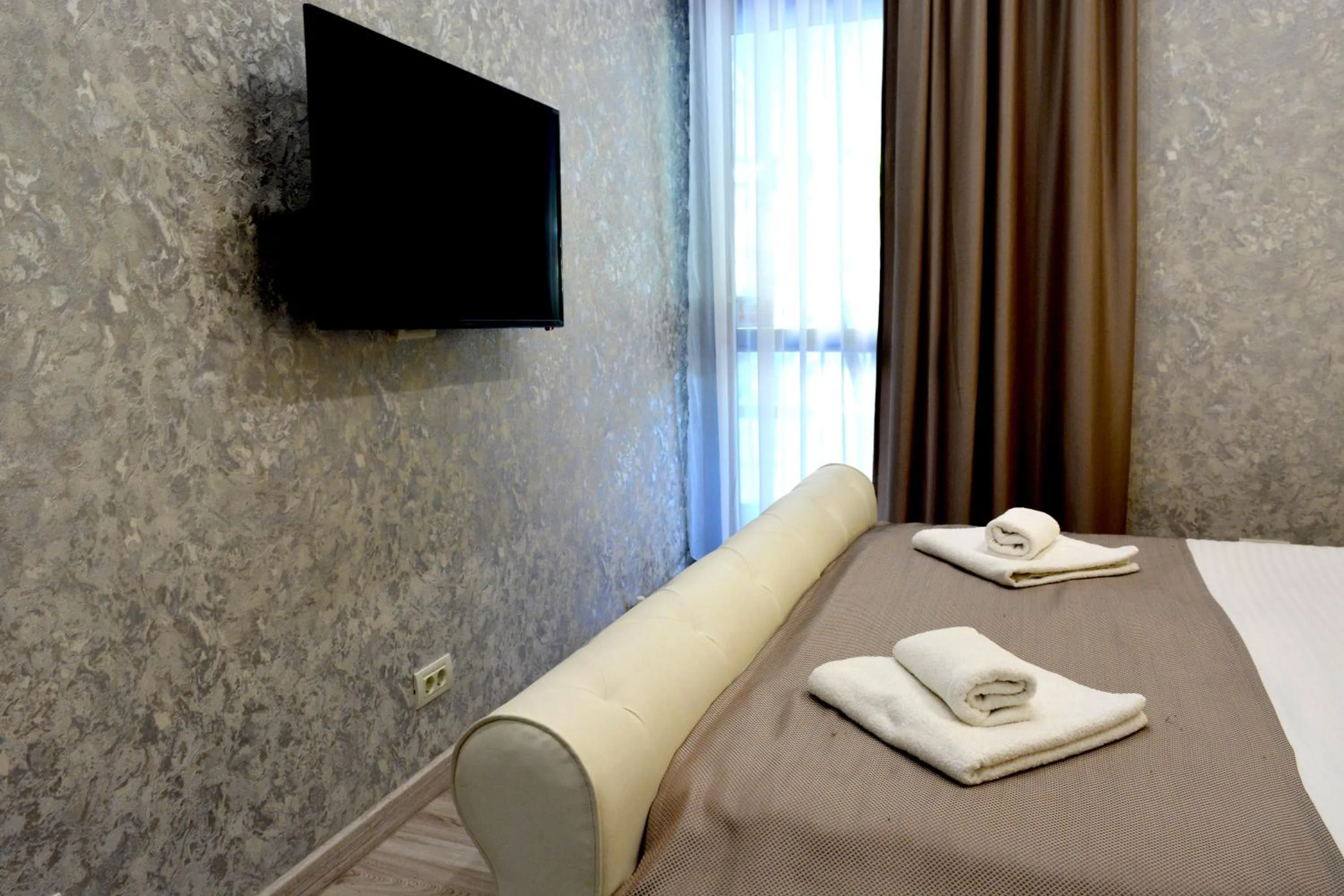 Bed in Arizet Boutique Mamaia