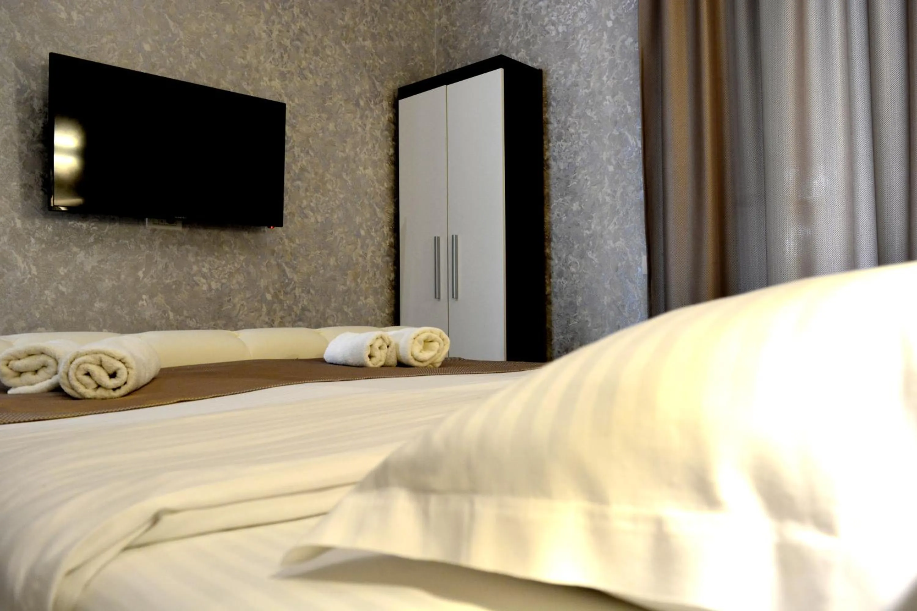 Bed in Arizet Boutique Mamaia