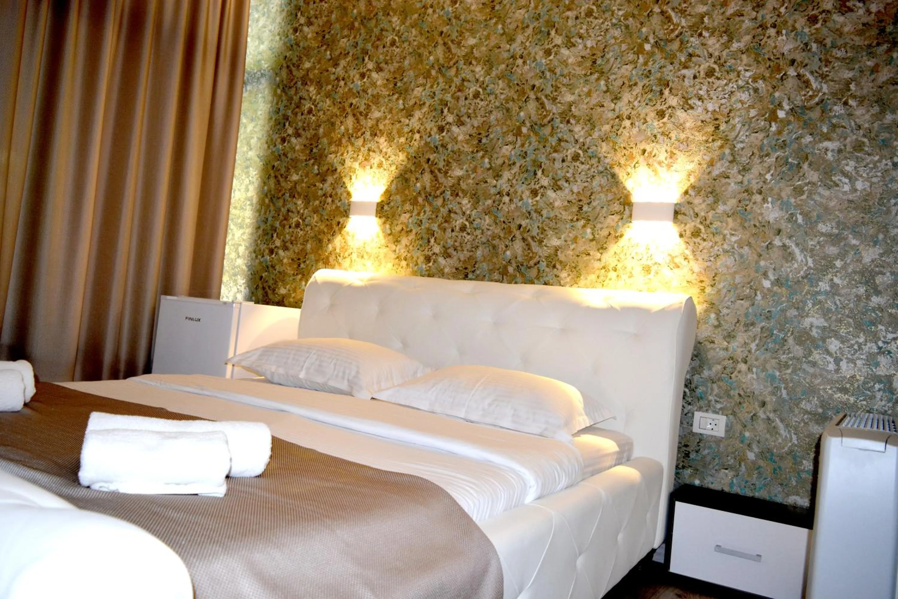 Bed in Arizet Boutique Mamaia