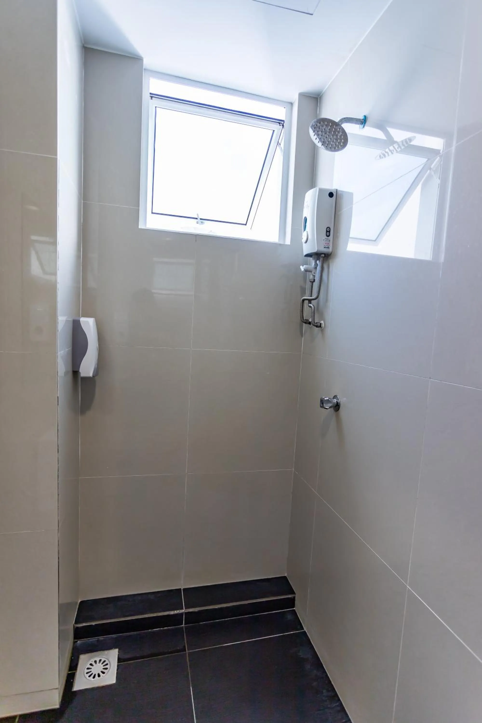 Shower in Emart Hotel (Riam)