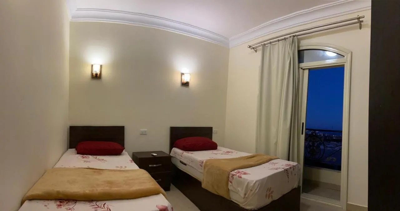 Bed in Bahga Palace 5 Residential Apartments