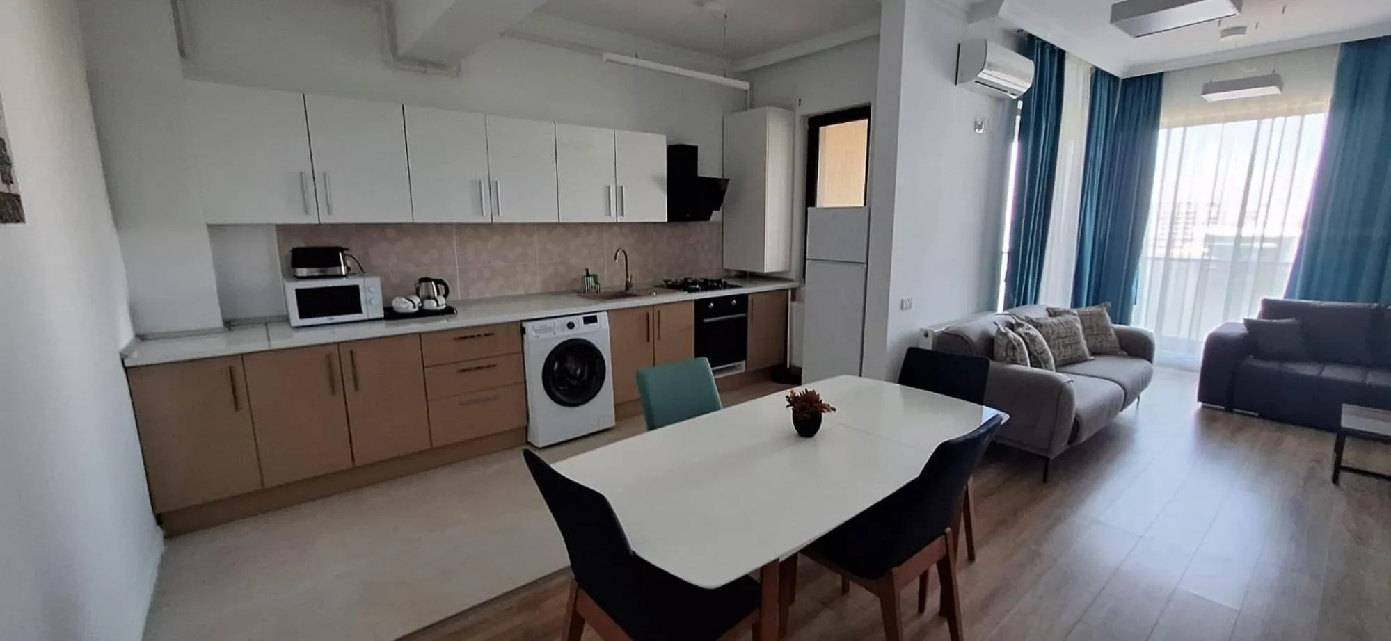 Kitchen or kitchenette in Solid Magic Apart Hotel