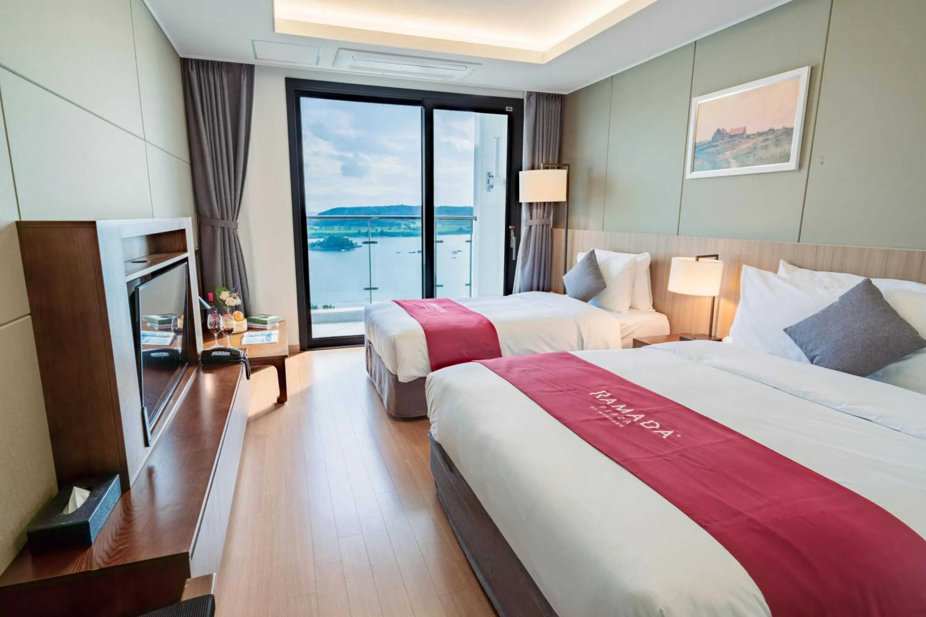 Bed in Ramada Plaza by Wyndham Dolsan Yeosu