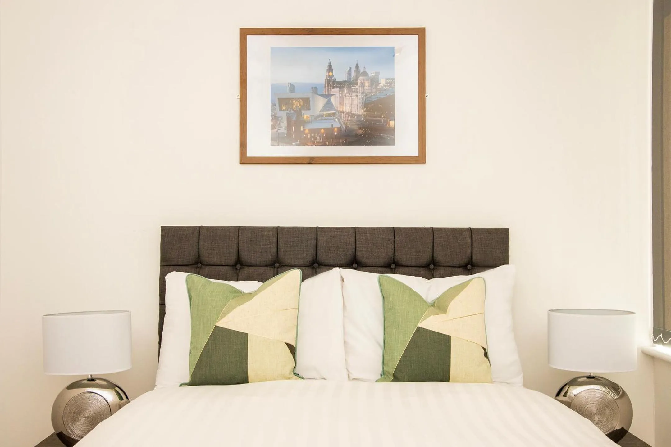 Bed in Lord Street Apartments By Happy Days