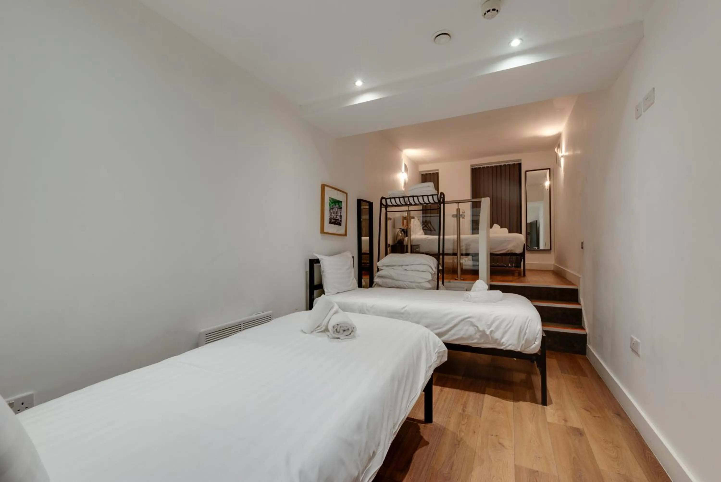 Bed in Lord Street Apartments By Happy Days