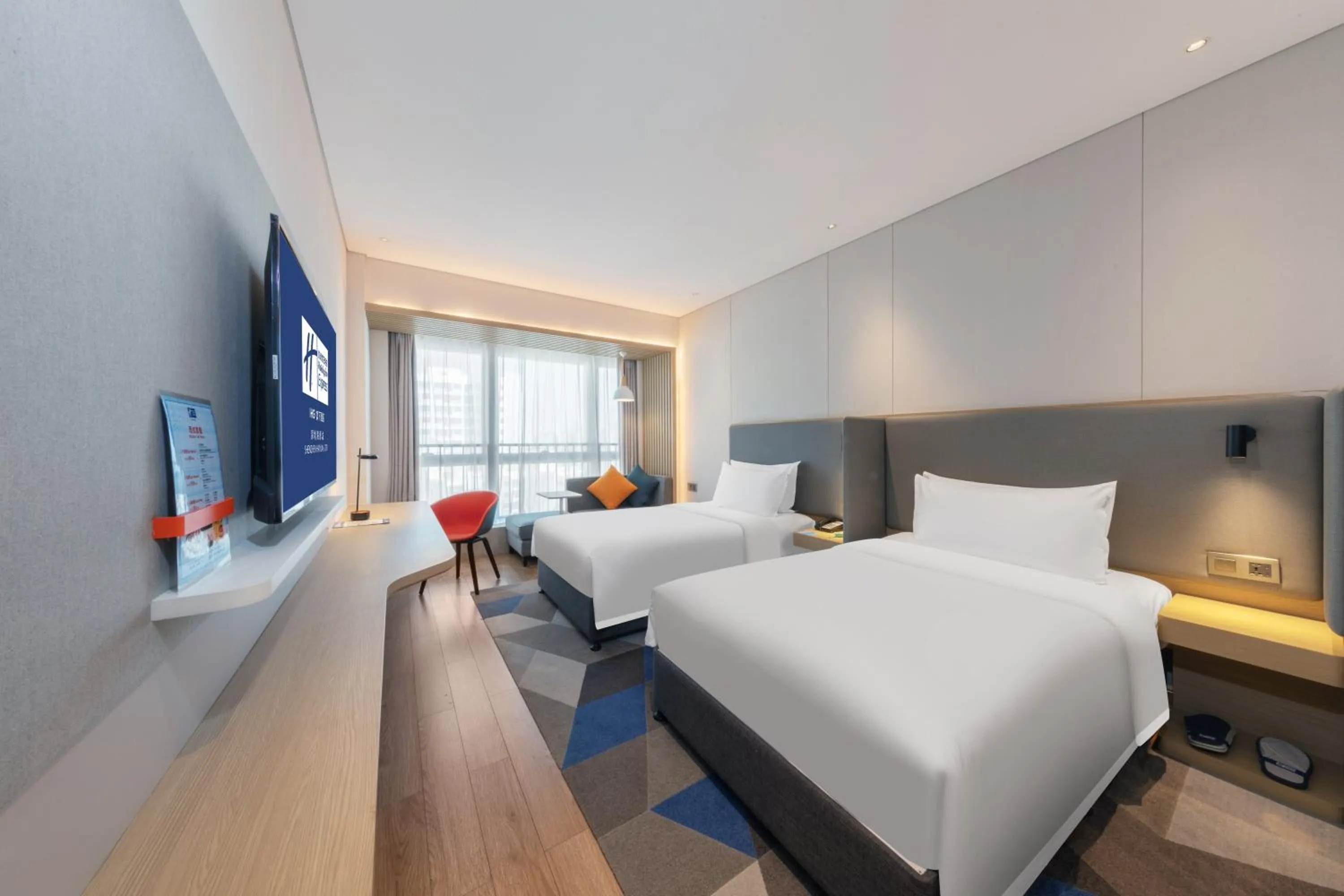 Bed in Holiday Inn Express Shenzhen Haiyuan City by IHG