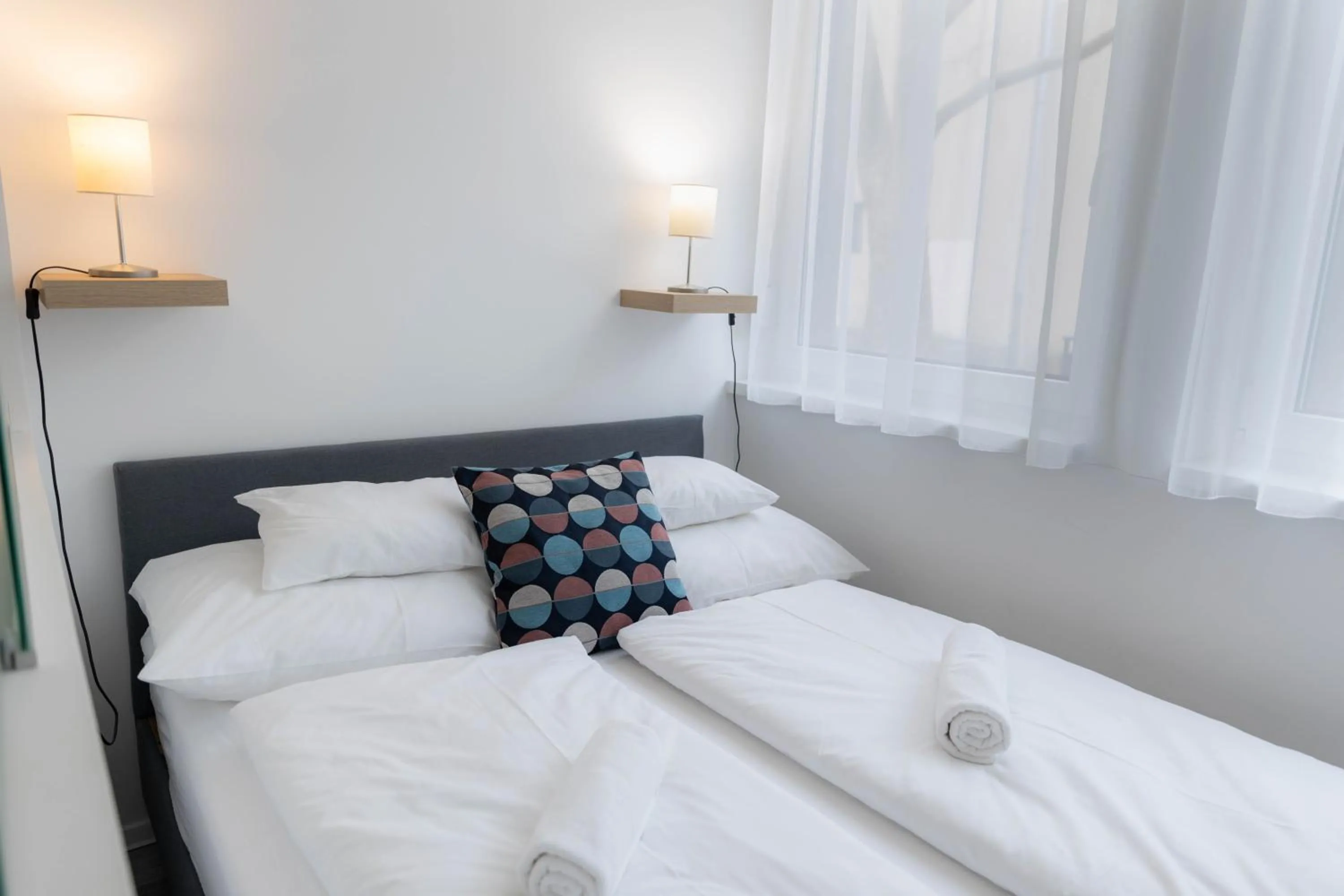 Bedroom, Bed in Roomstore Studio Apartments