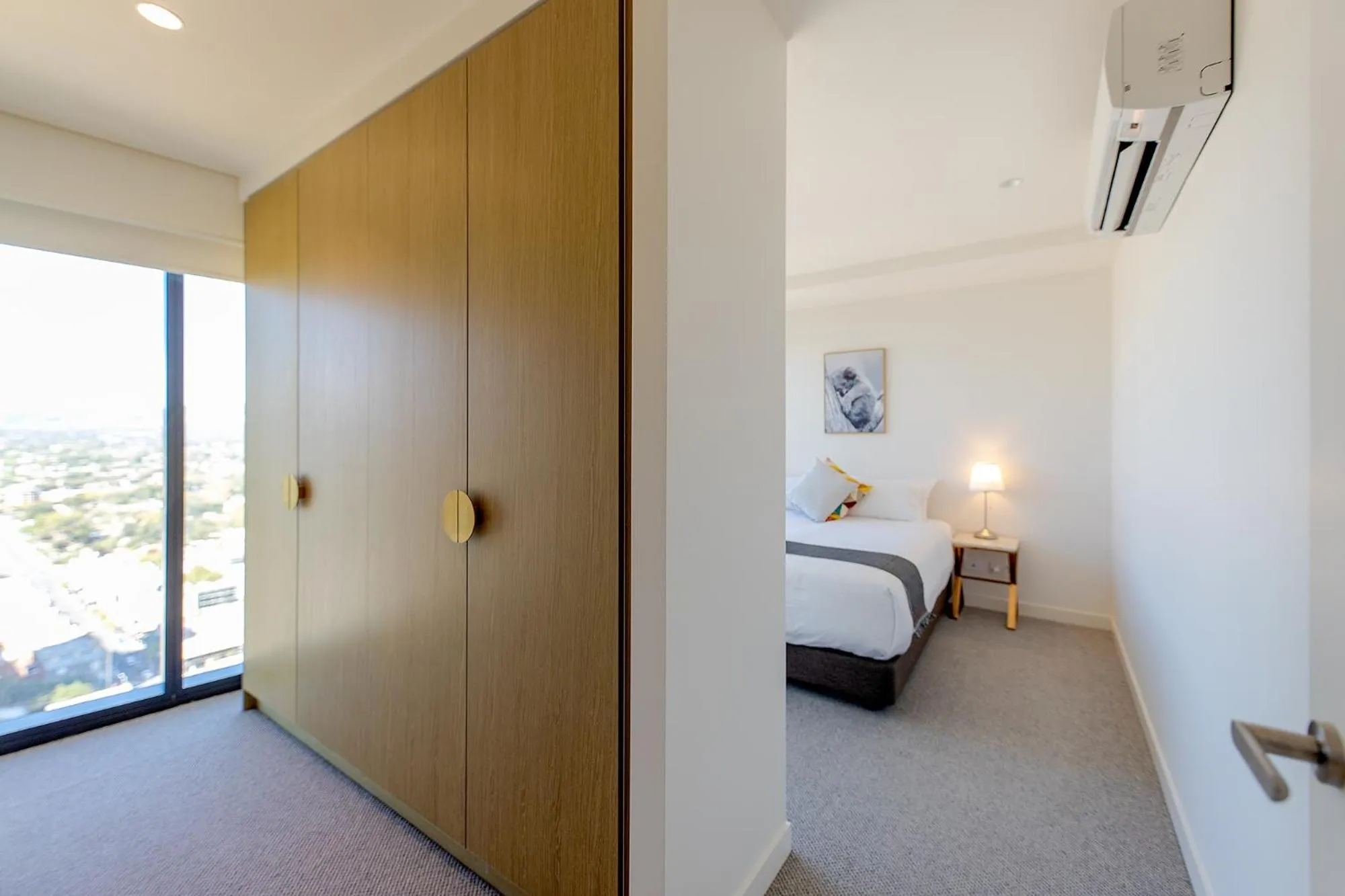 Bed in Realm Apartments by CLLIX