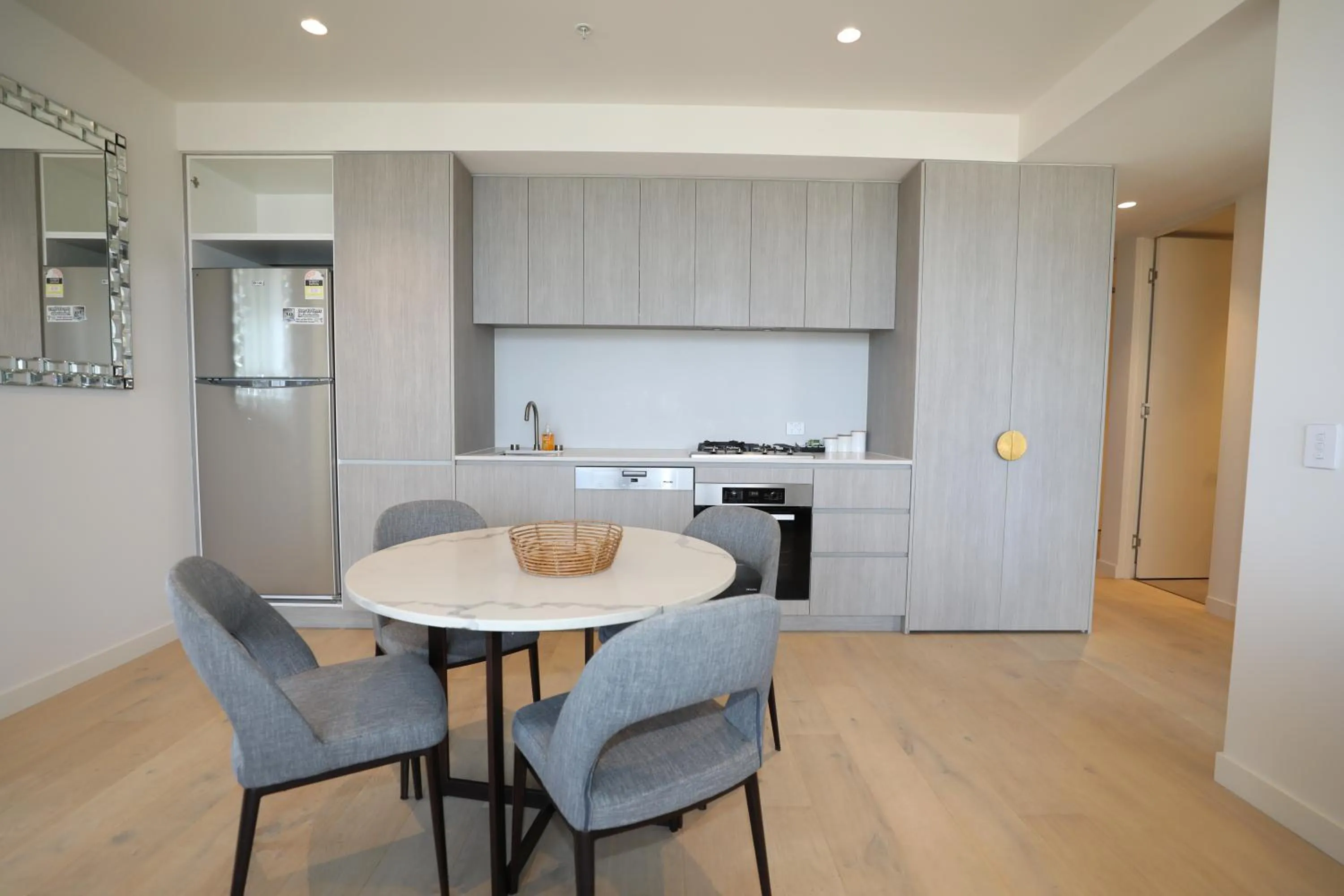 Dining area in Realm Apartments by CLLIX