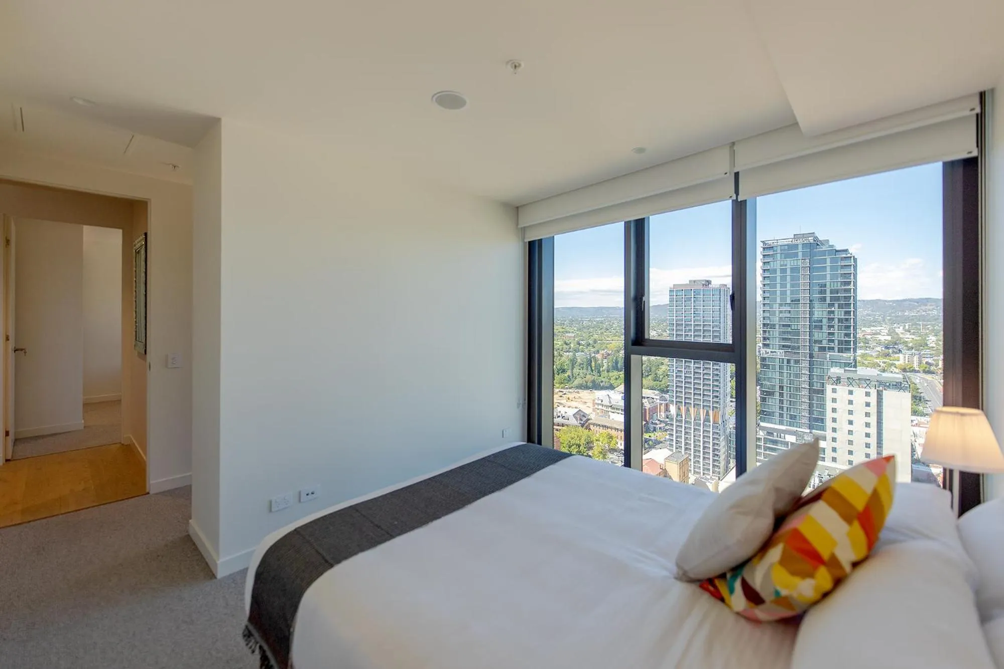 Bed in Realm Apartments by CLLIX