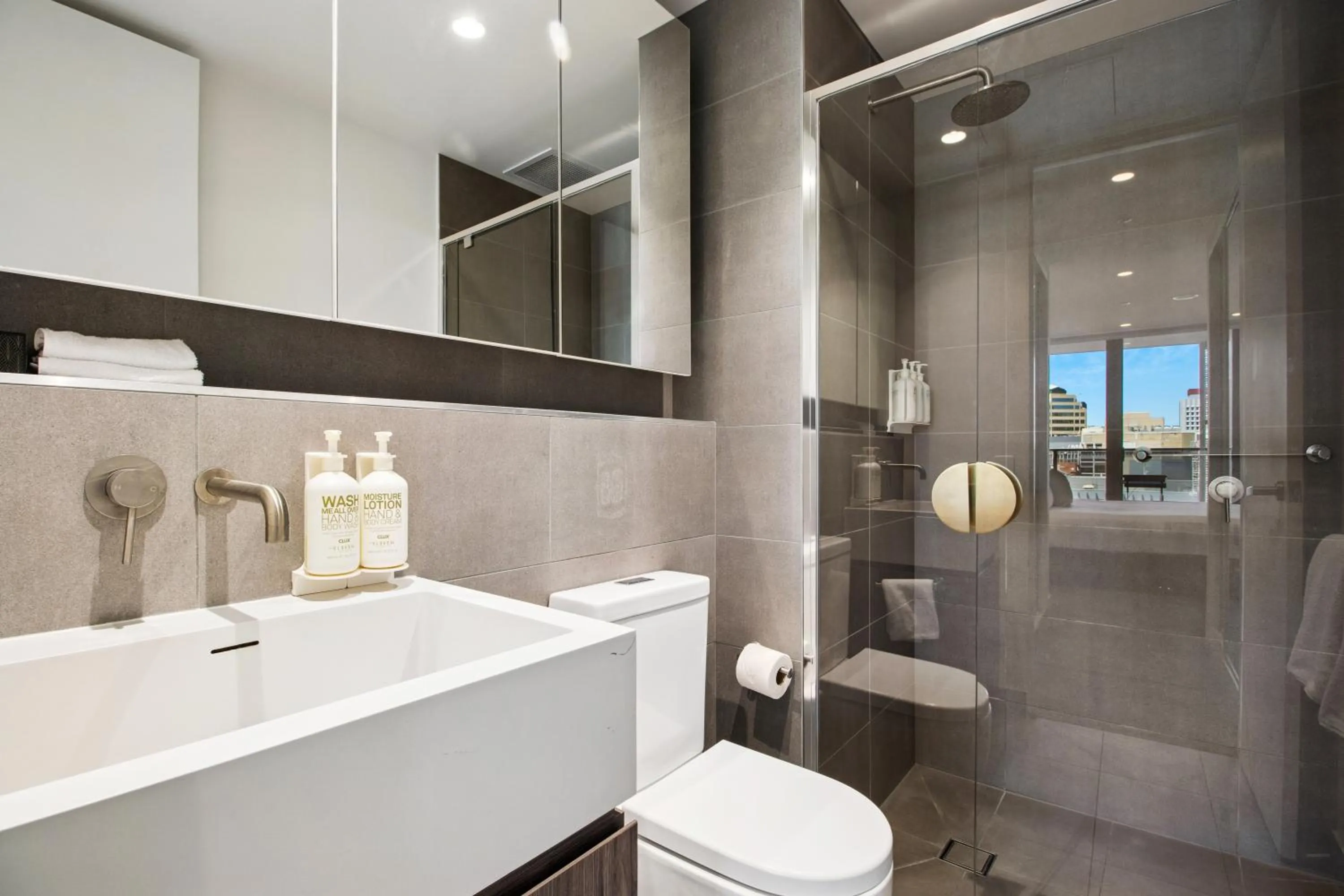 Shower in Realm Apartments by CLLIX