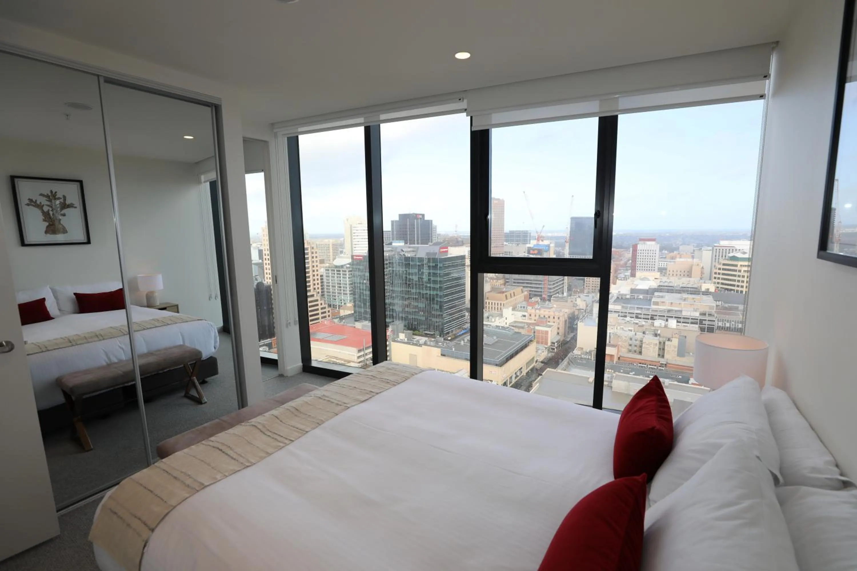 Bed in Realm Apartments by CLLIX