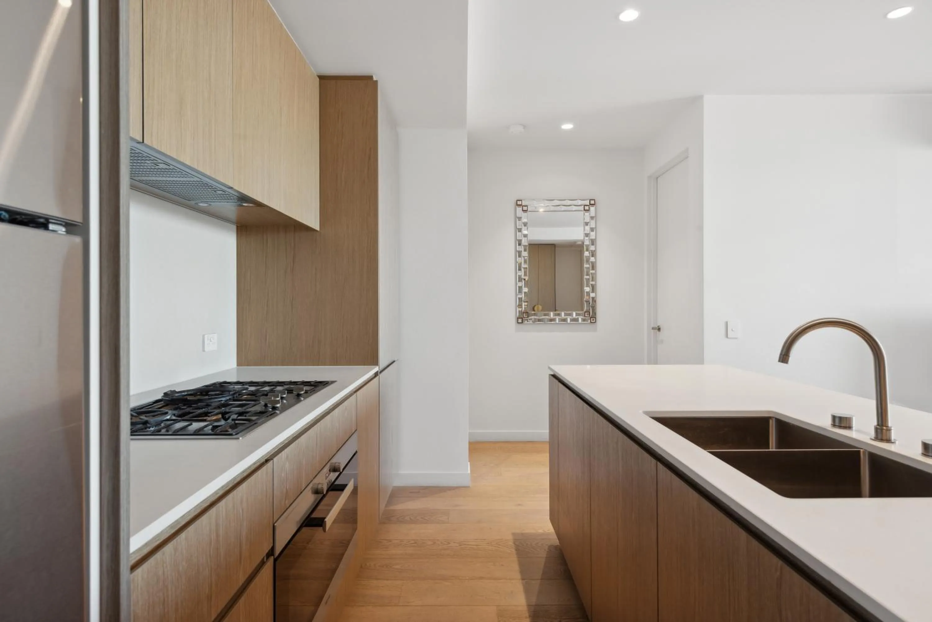 Kitchen or kitchenette in Realm Apartments by CLLIX