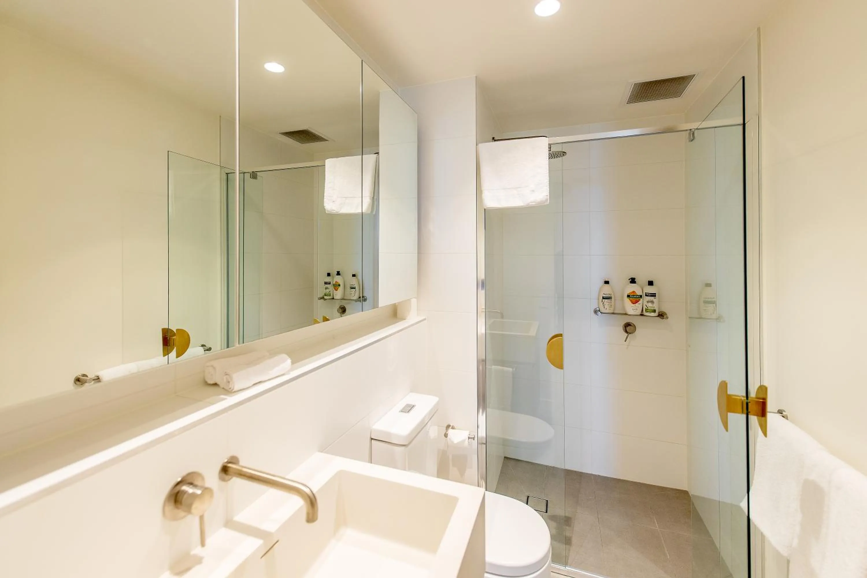 Shower in Realm Apartments by CLLIX