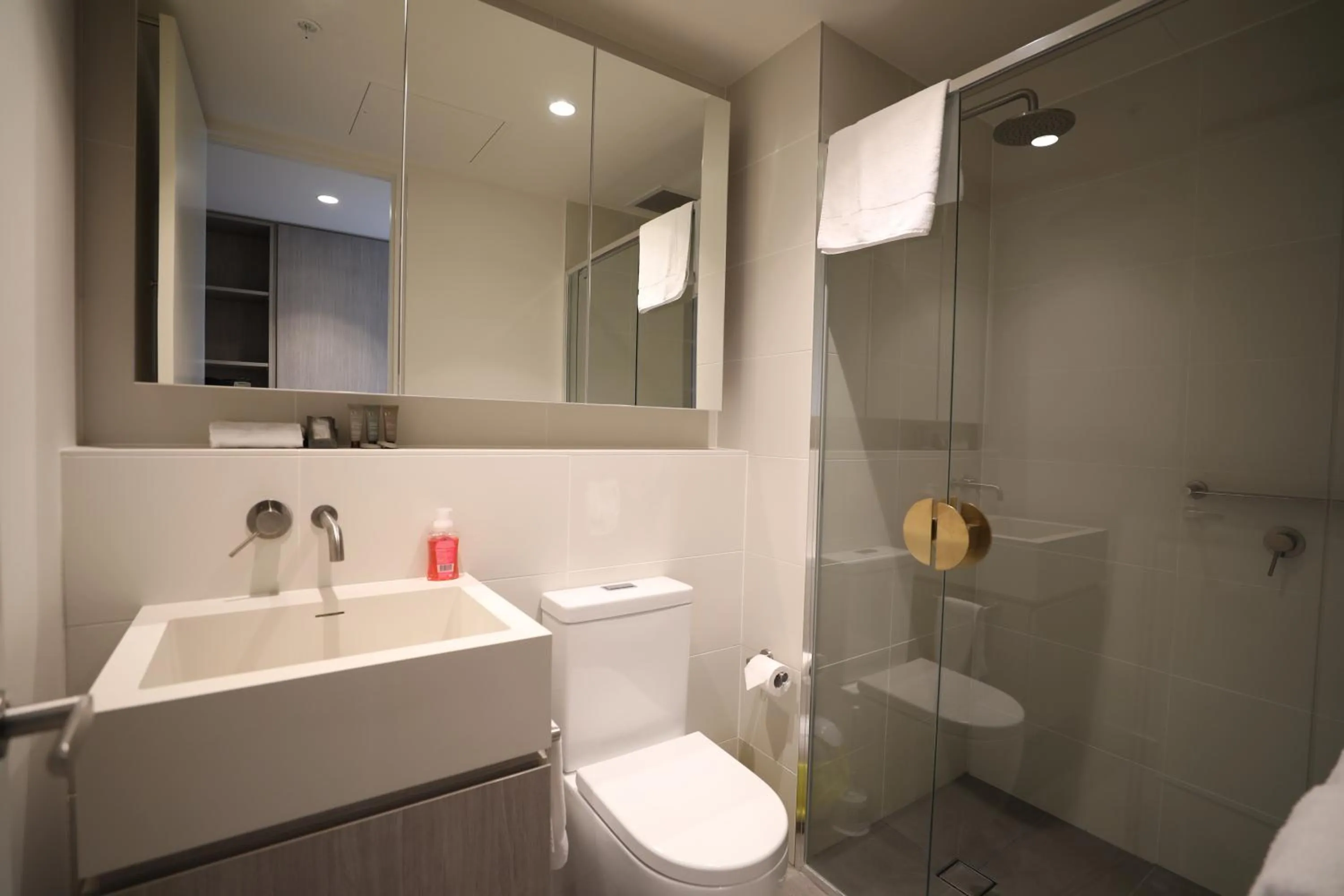 Shower in Realm Apartments by CLLIX