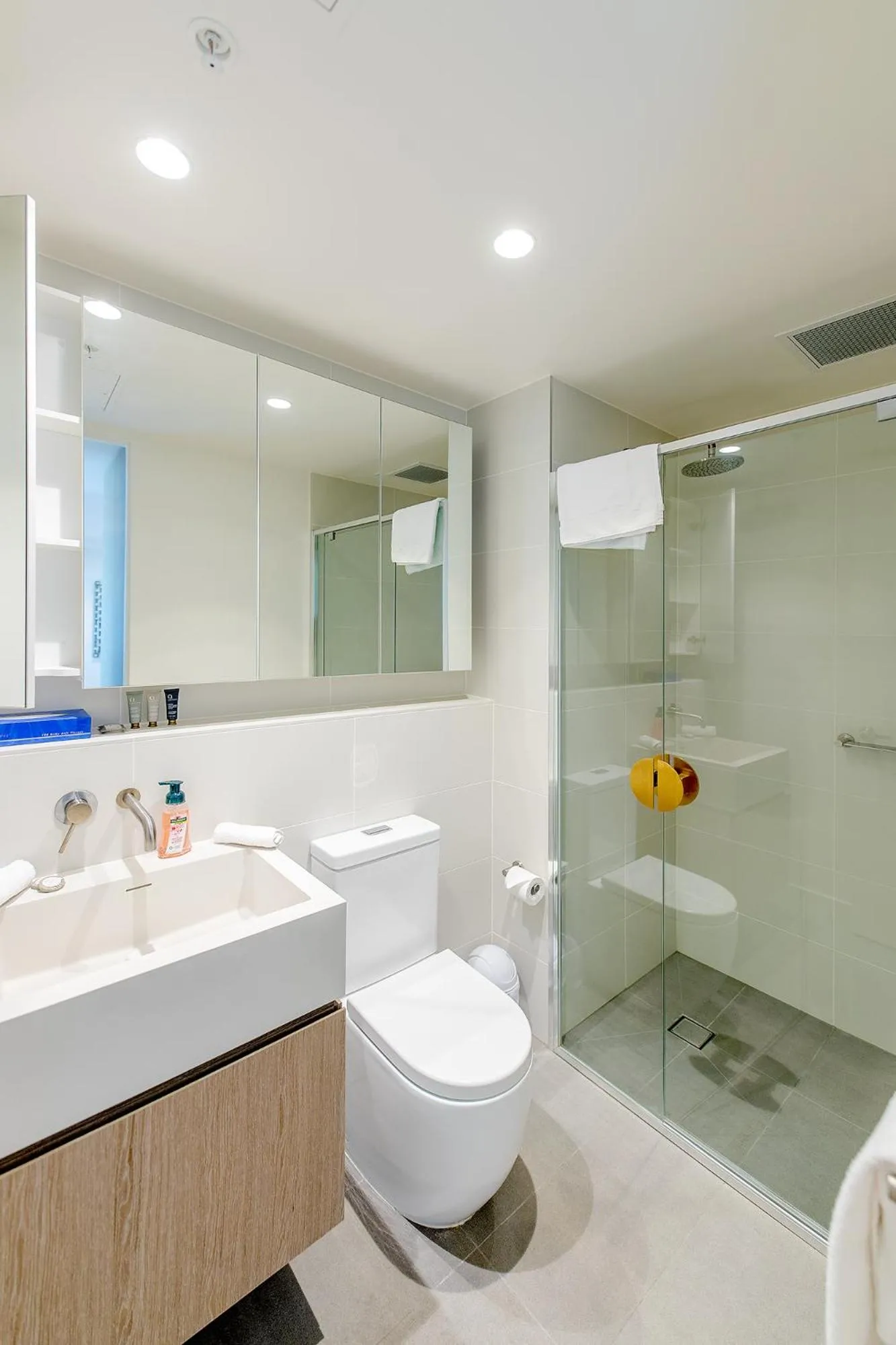 Shower in Realm Apartments by CLLIX