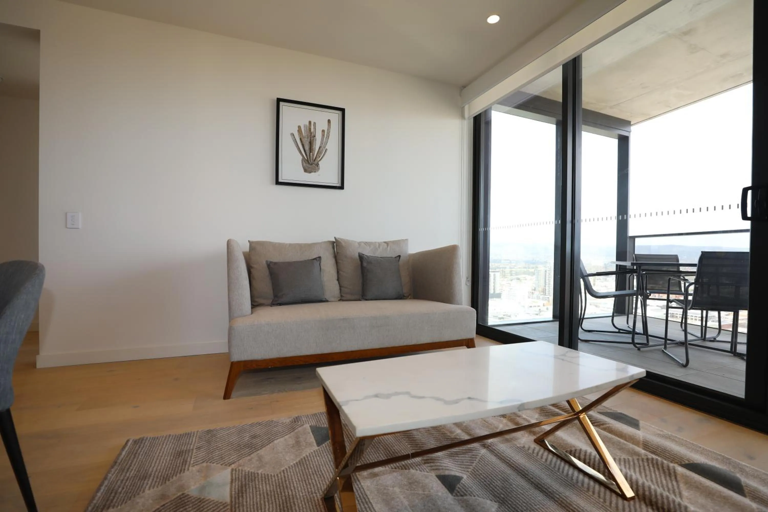 Living room in Realm Apartments by CLLIX