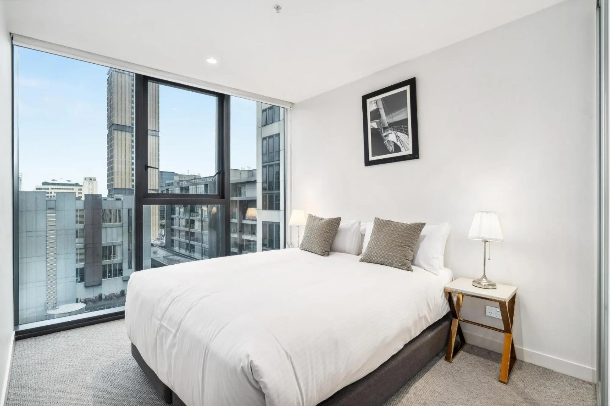 Bed in Realm Apartments by CLLIX