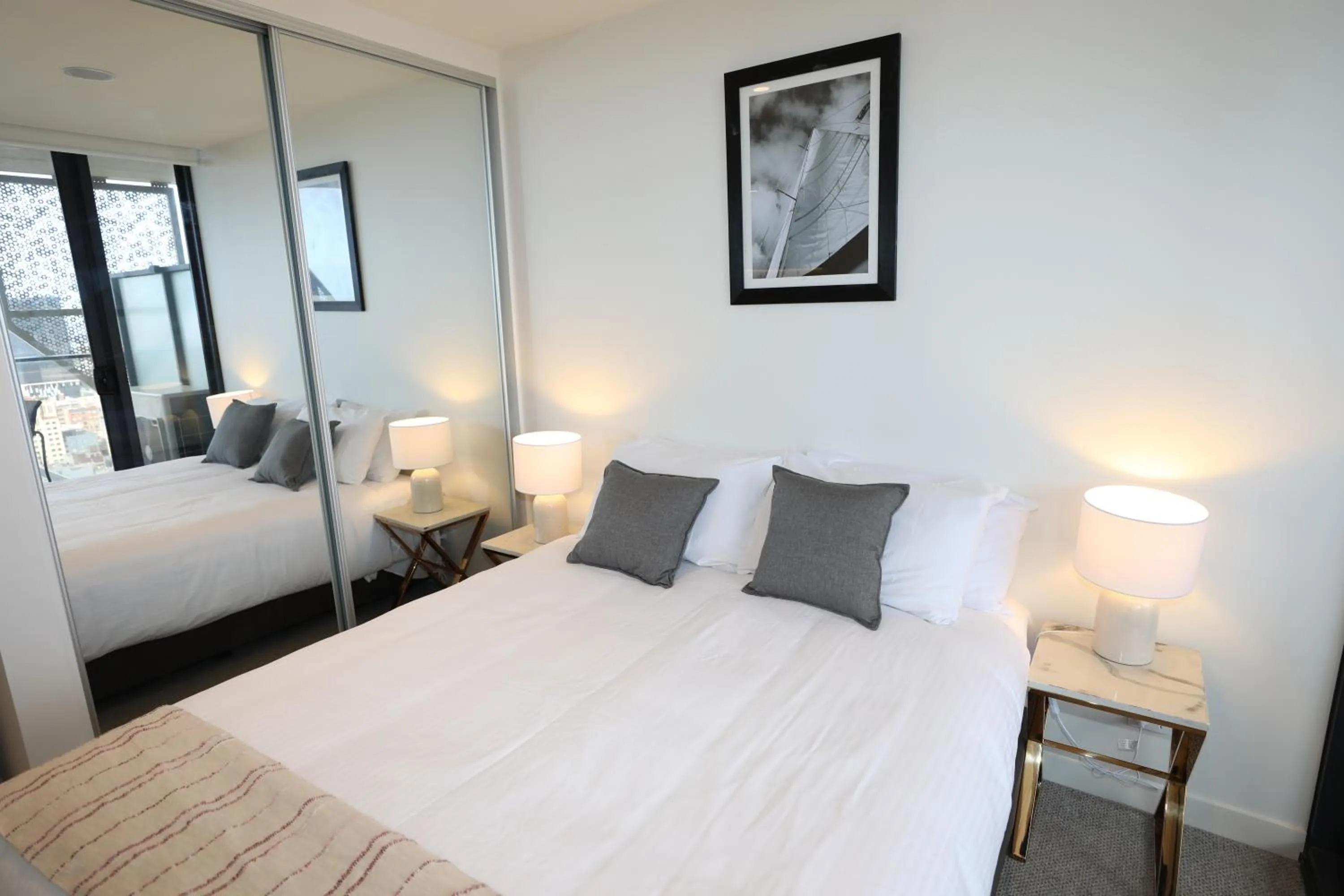 Bed in Realm Apartments by CLLIX