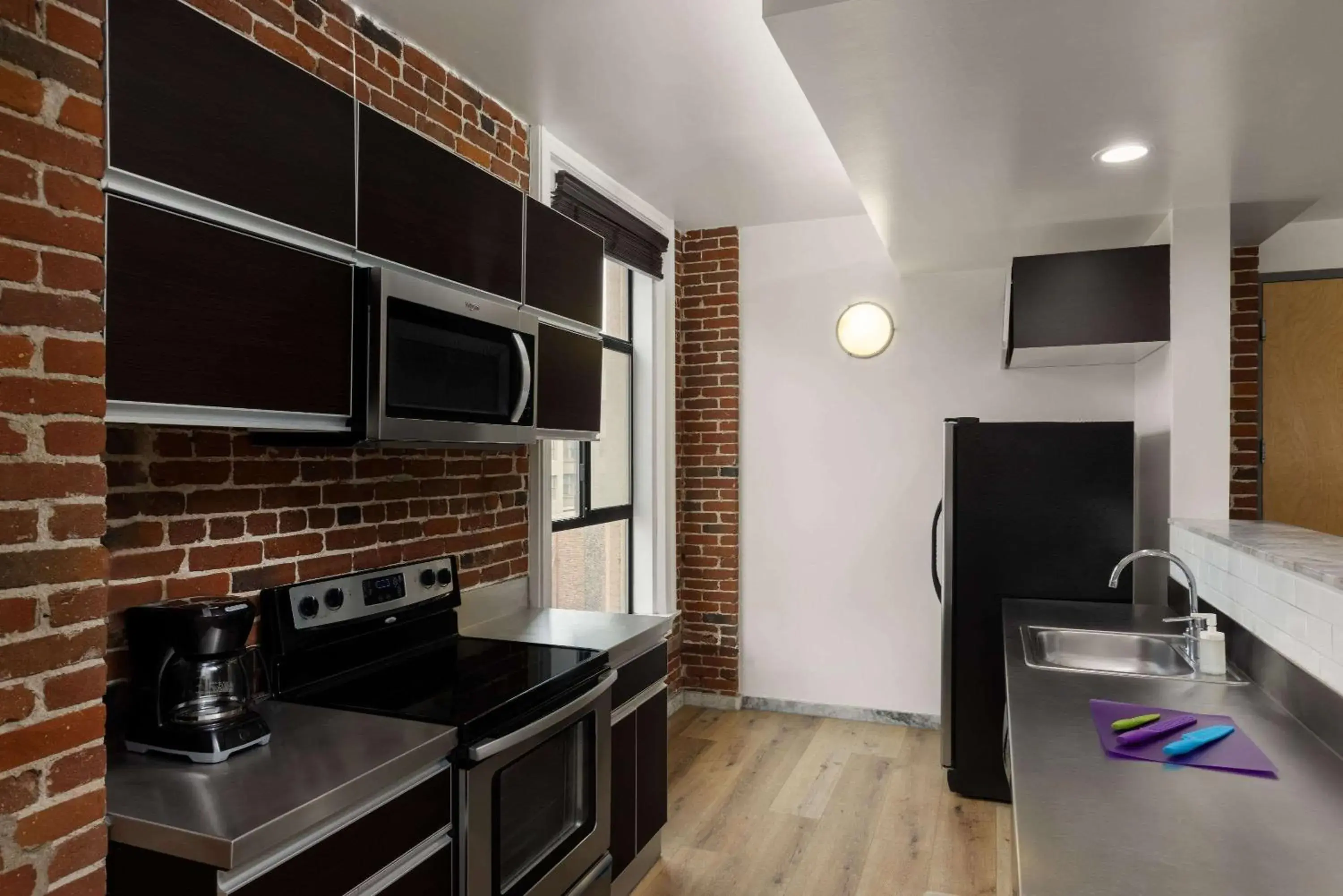 Kitchen or kitchenette in The Haas, Trademark Collection by Wyndham Kitchen or kitchenette in The Haas, Trademark Collection by Wyndham