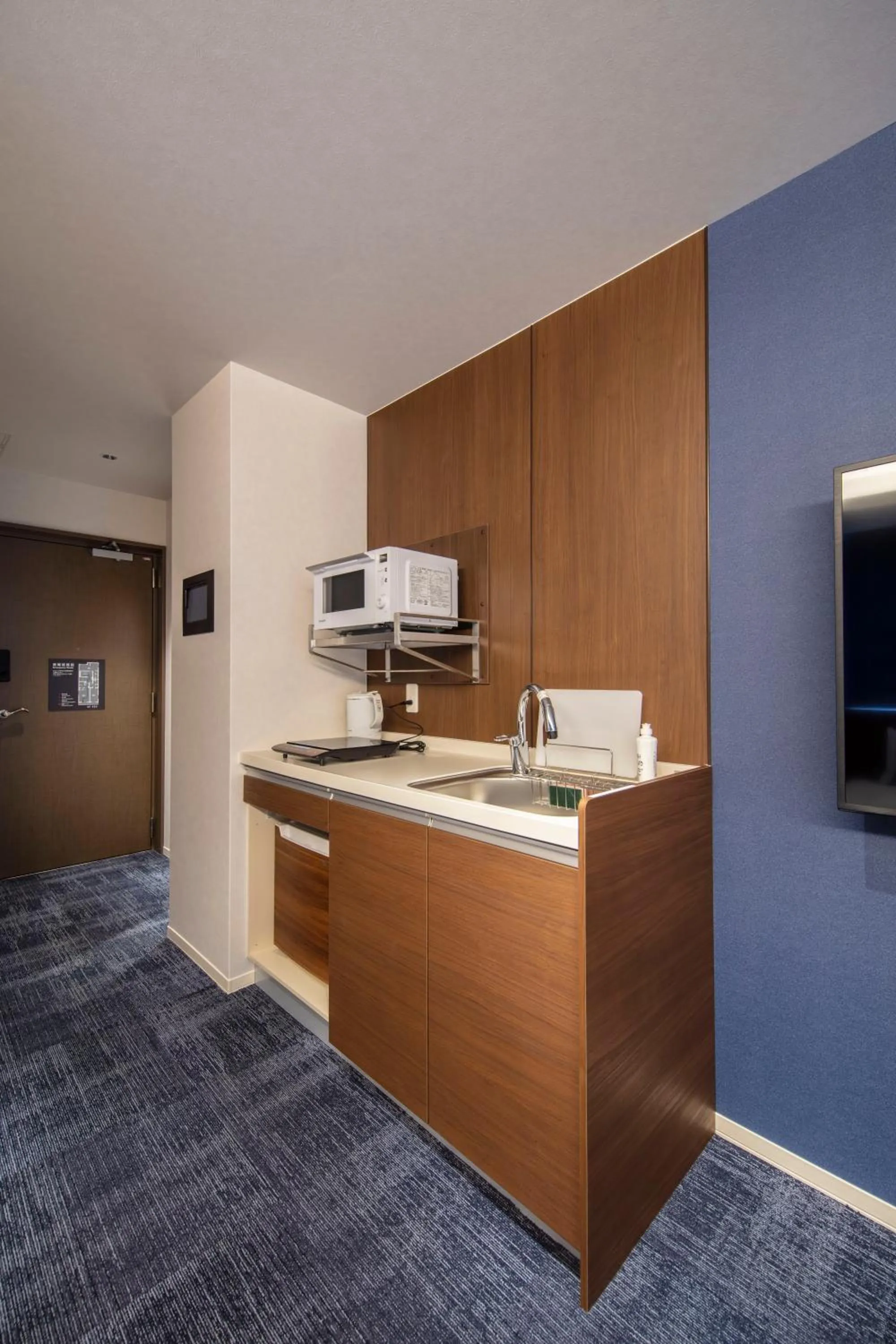 Kitchen or kitchenette in GRAND BASE Okayama Ekimae