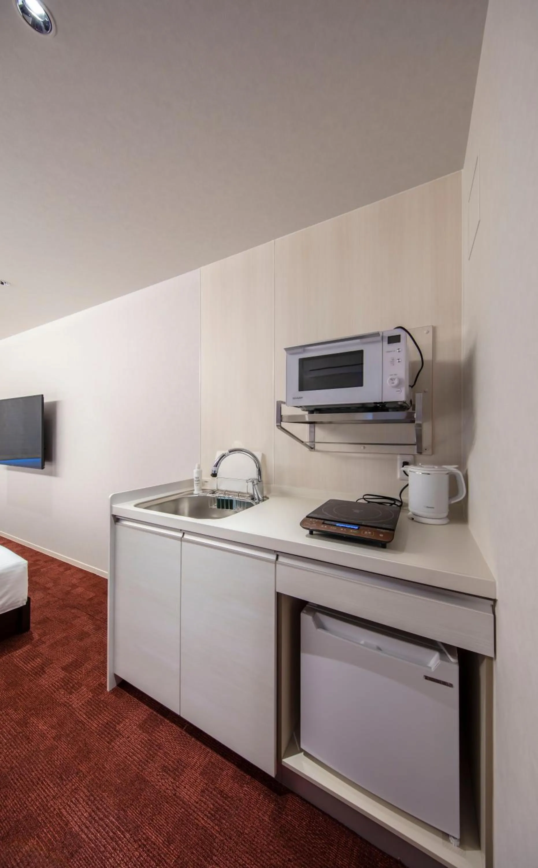 Kitchen or kitchenette in GRAND BASE Okayama Ekimae