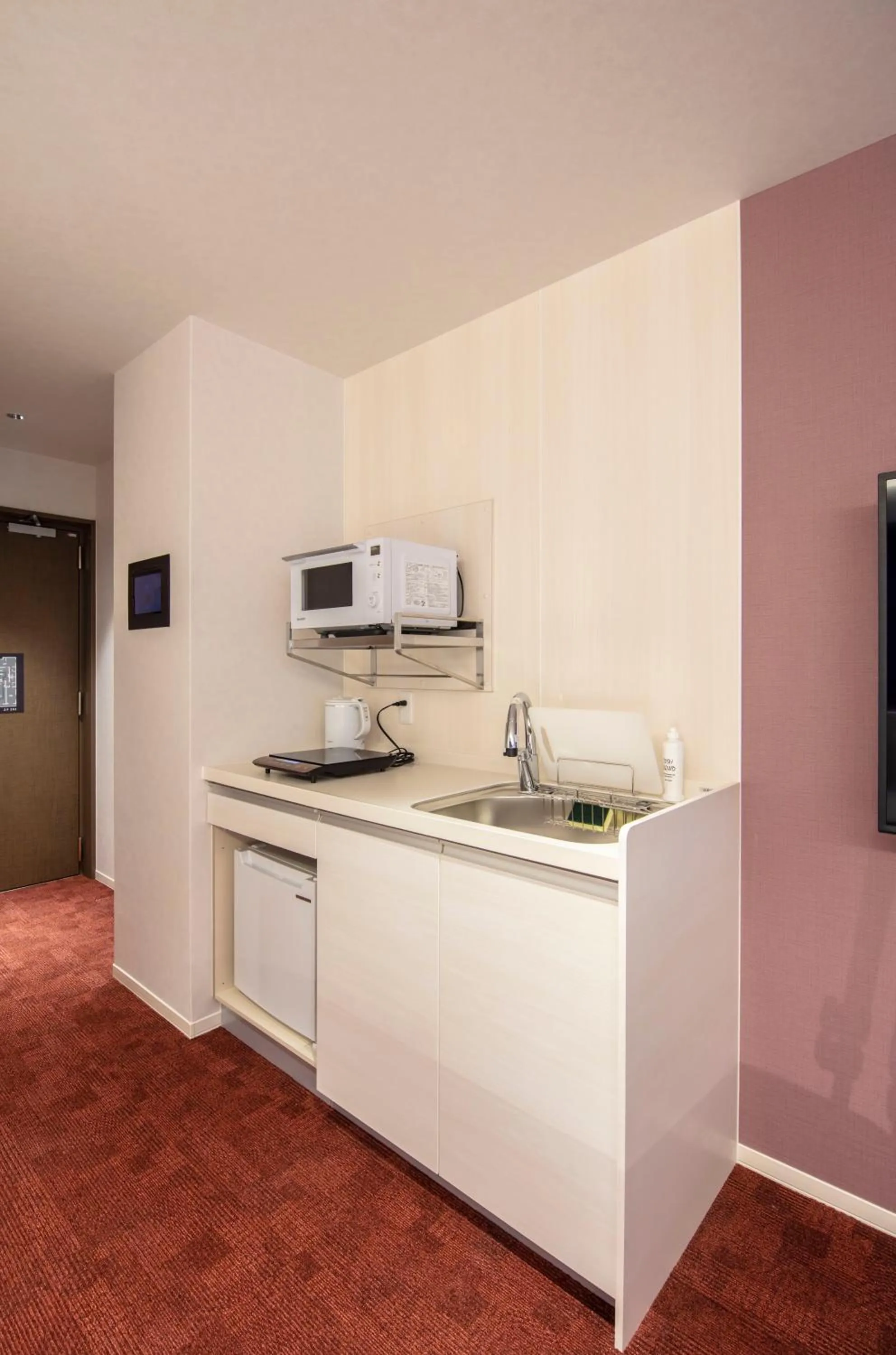 Kitchen or kitchenette in GRAND BASE Okayama Ekimae