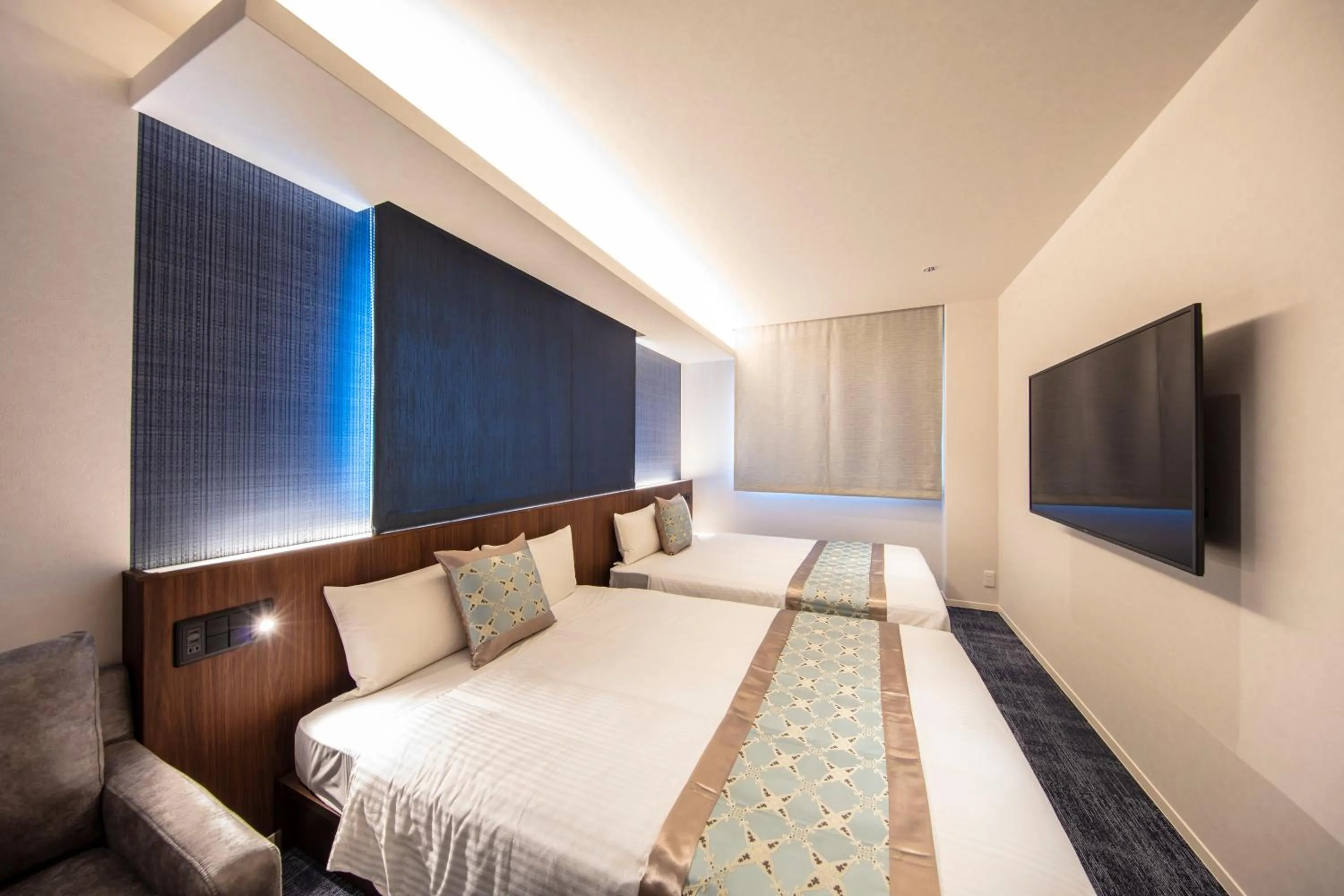 Photo of the whole room, Bed in GRAND BASE Okayama Ekimae