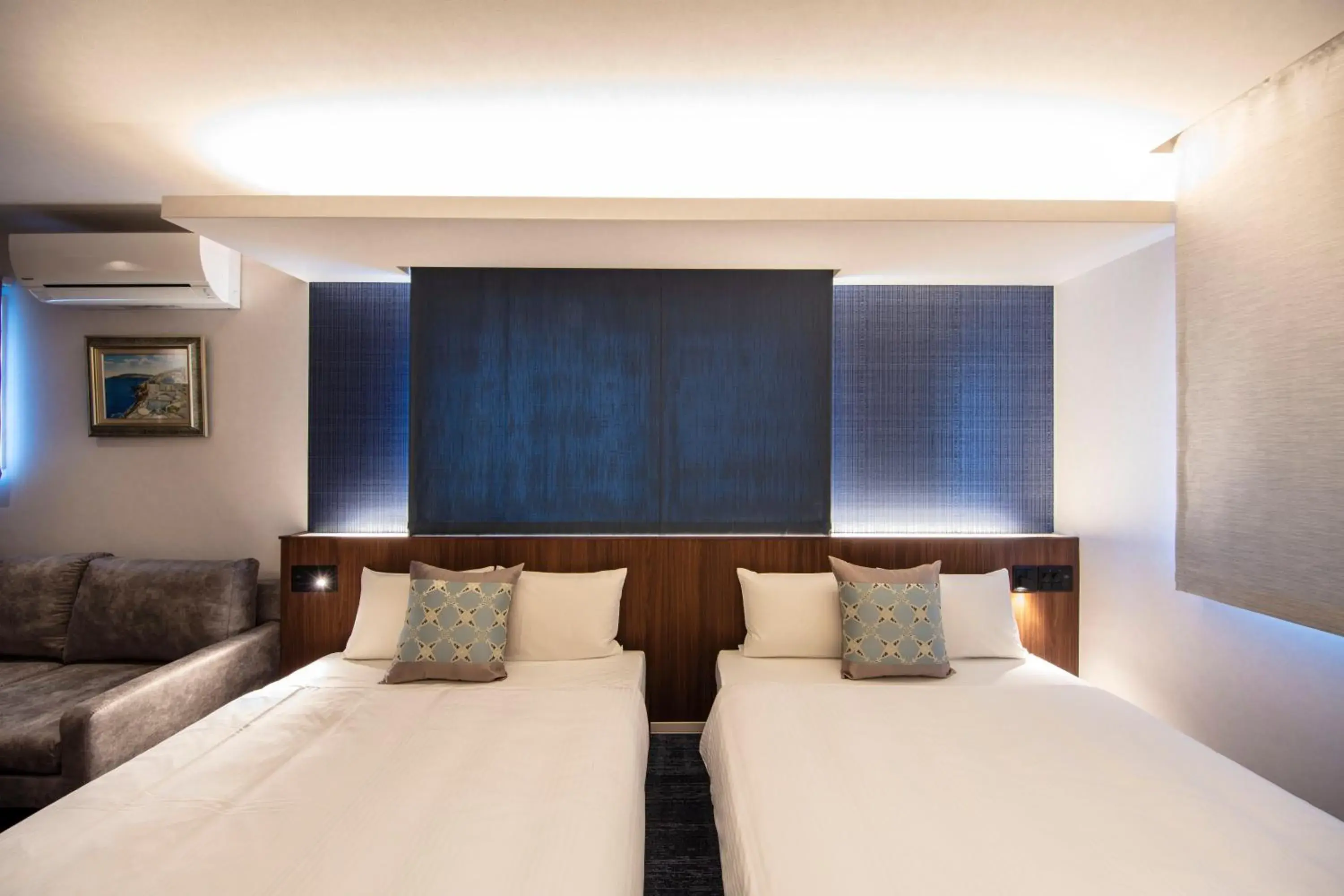 Bed in GRAND BASE Okayama Ekimae Bed in GRAND BASE Okayama Ekimae