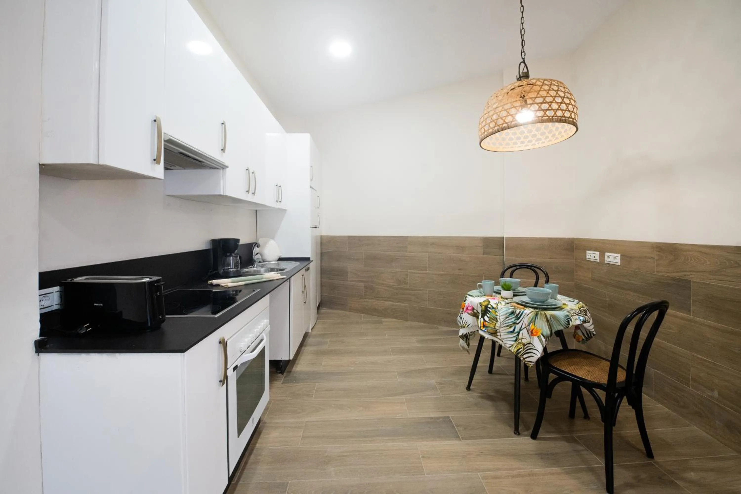 Kitchen or kitchenette in Suites La Merced