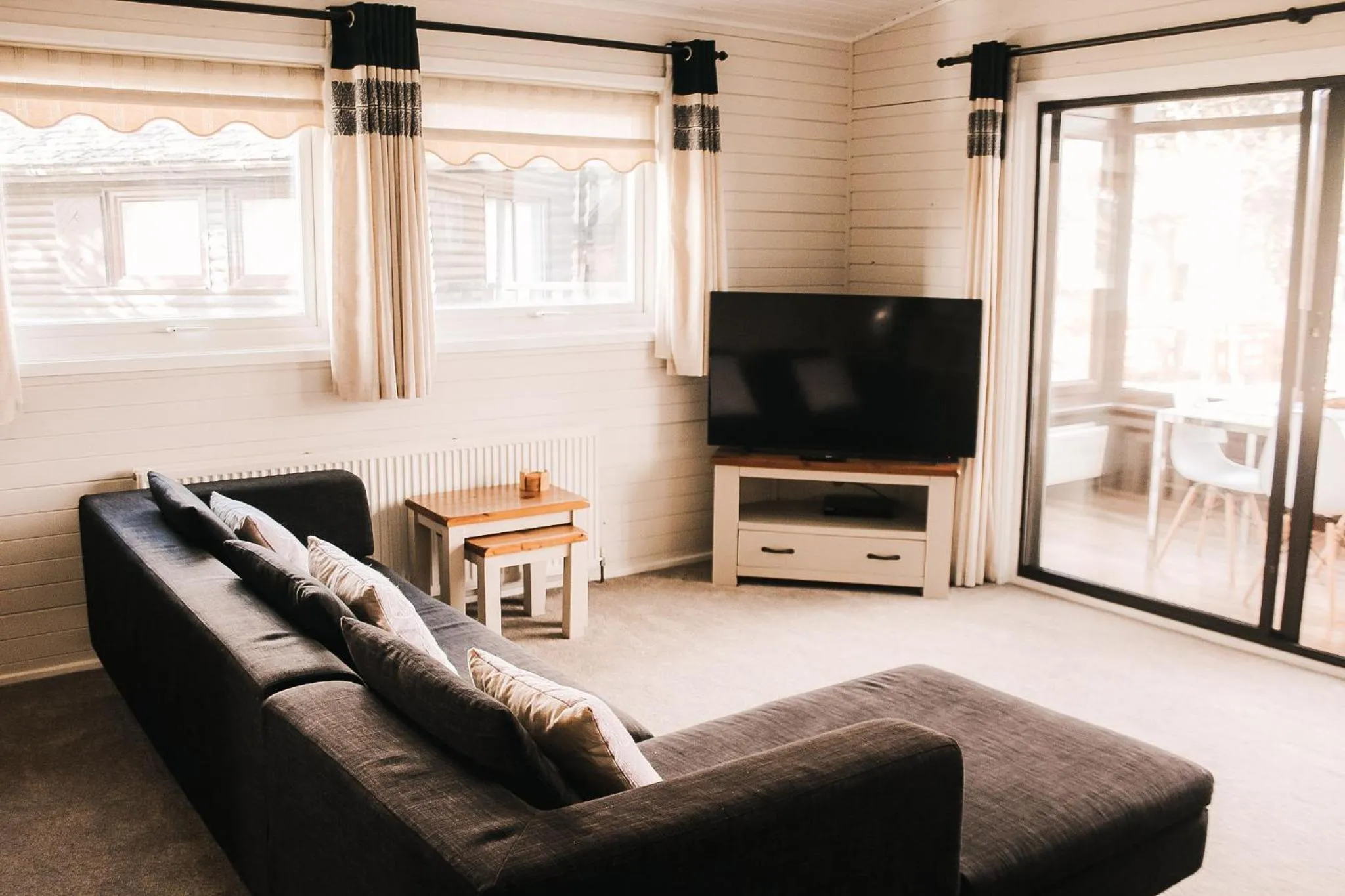 Communal lounge/ TV room in Keer Side Lodge, Luxury lodge with private hot tub at Pine Lake Resort