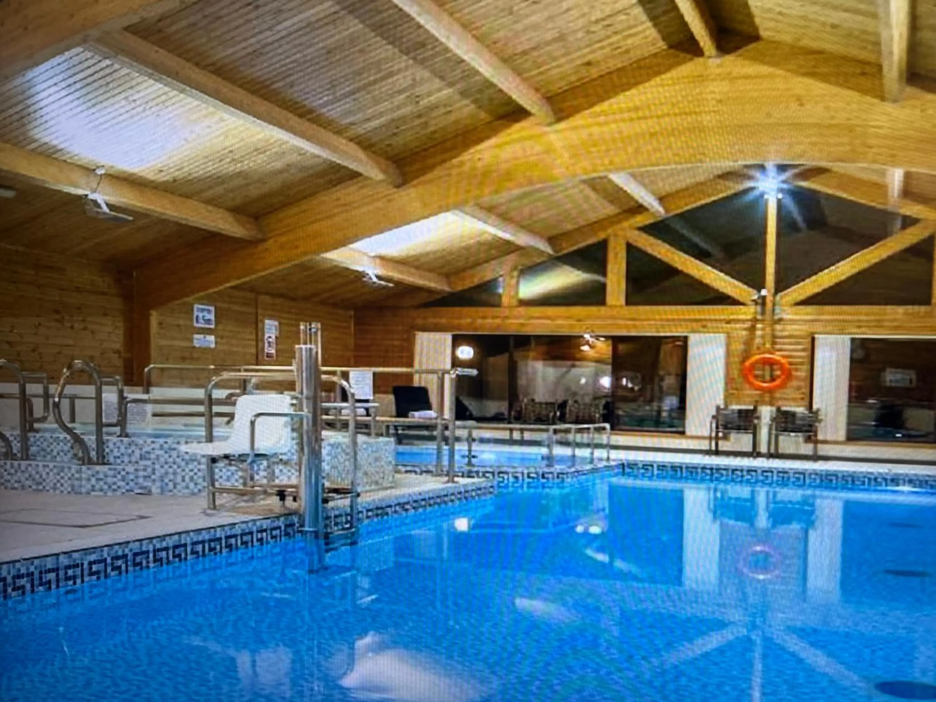Swimming pool in Keer Side Lodge, Luxury lodge with private hot tub at Pine Lake Resort