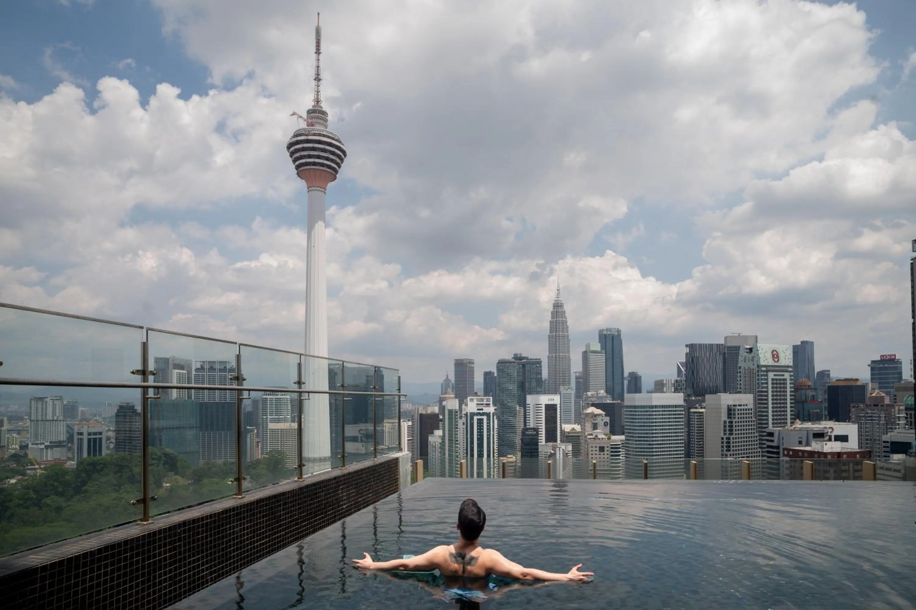Pool view in Ceylonz Suites KLCC Rooftop Infinity Pool KL Tower View