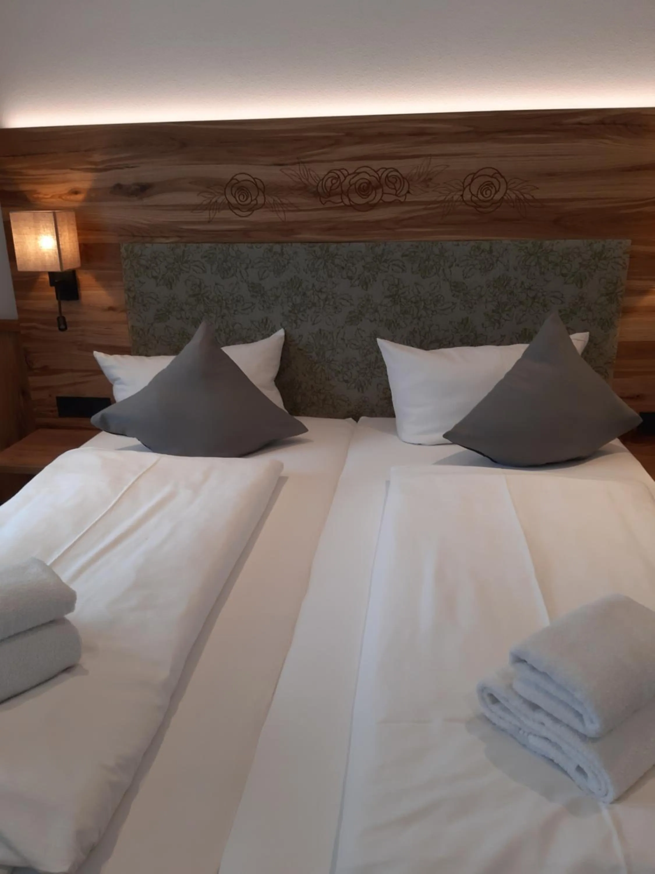 Bed in DEVA Hotel Alpenglück