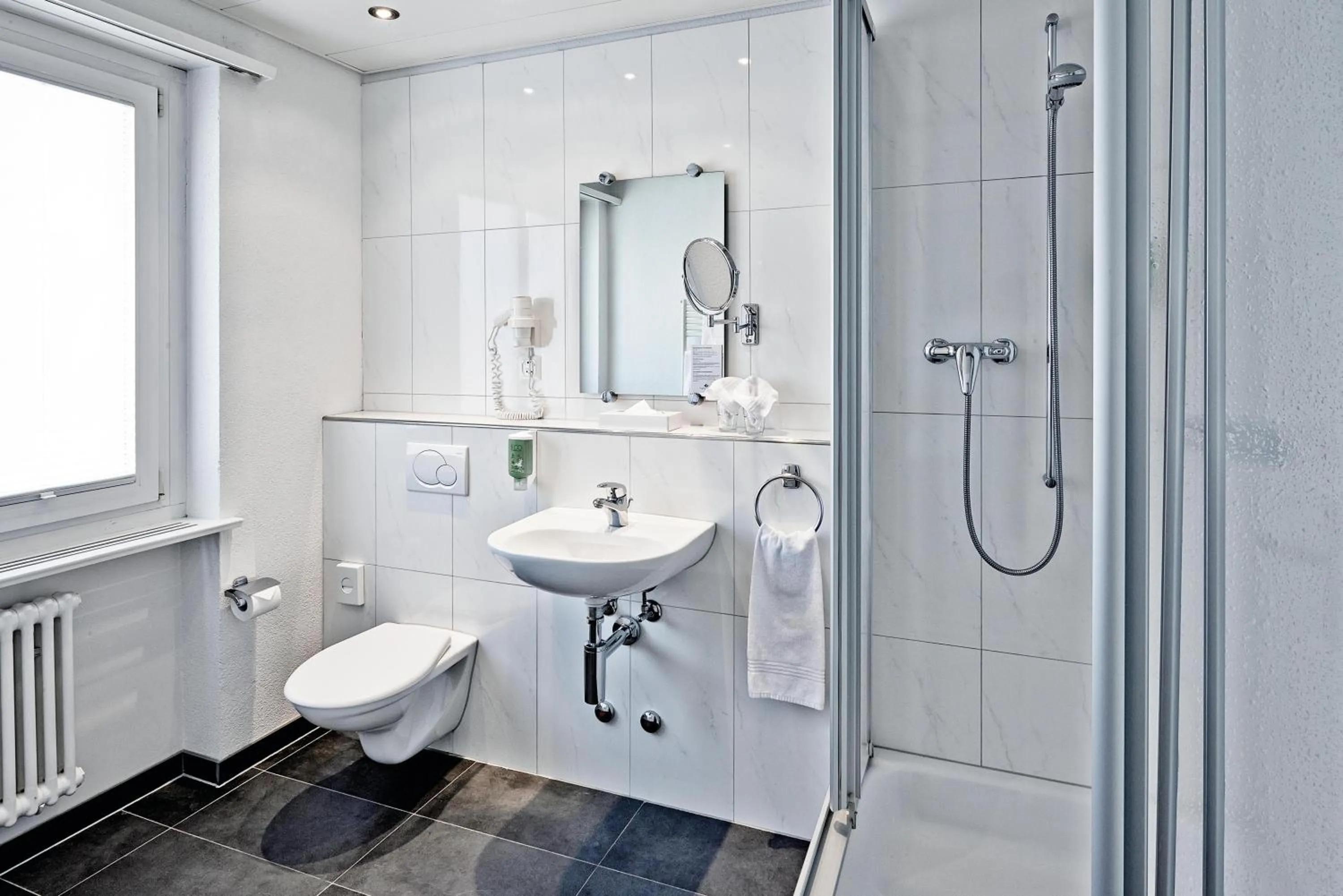 Bathroom in Sorell Hotel Sonnental Dübendorf