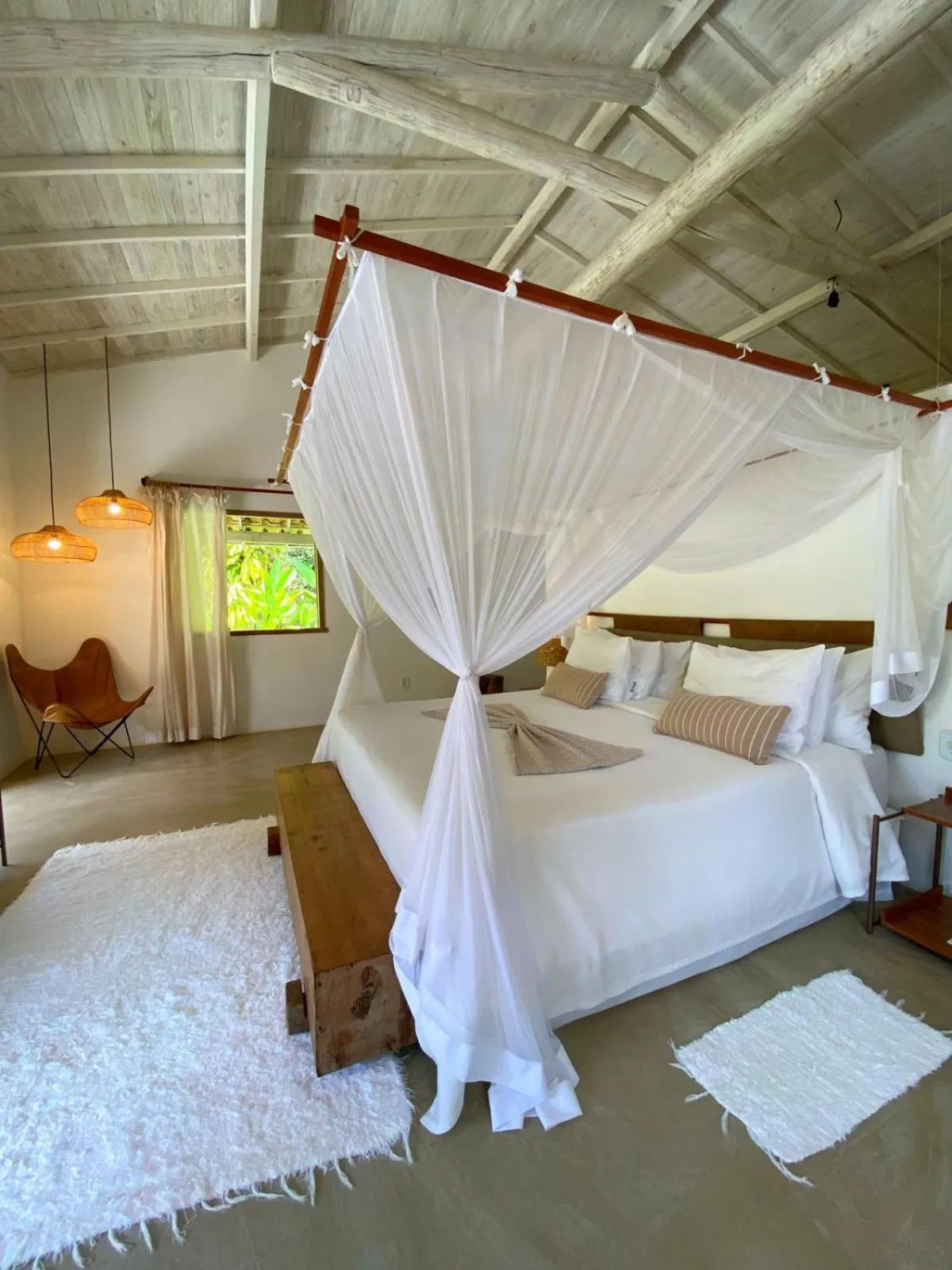 Bed in Villa dos Nativos Boutique Hotel