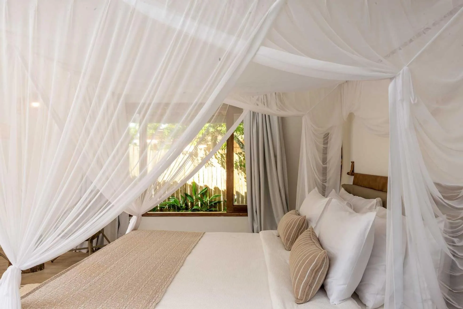 Bed in Villa dos Nativos Boutique Hotel