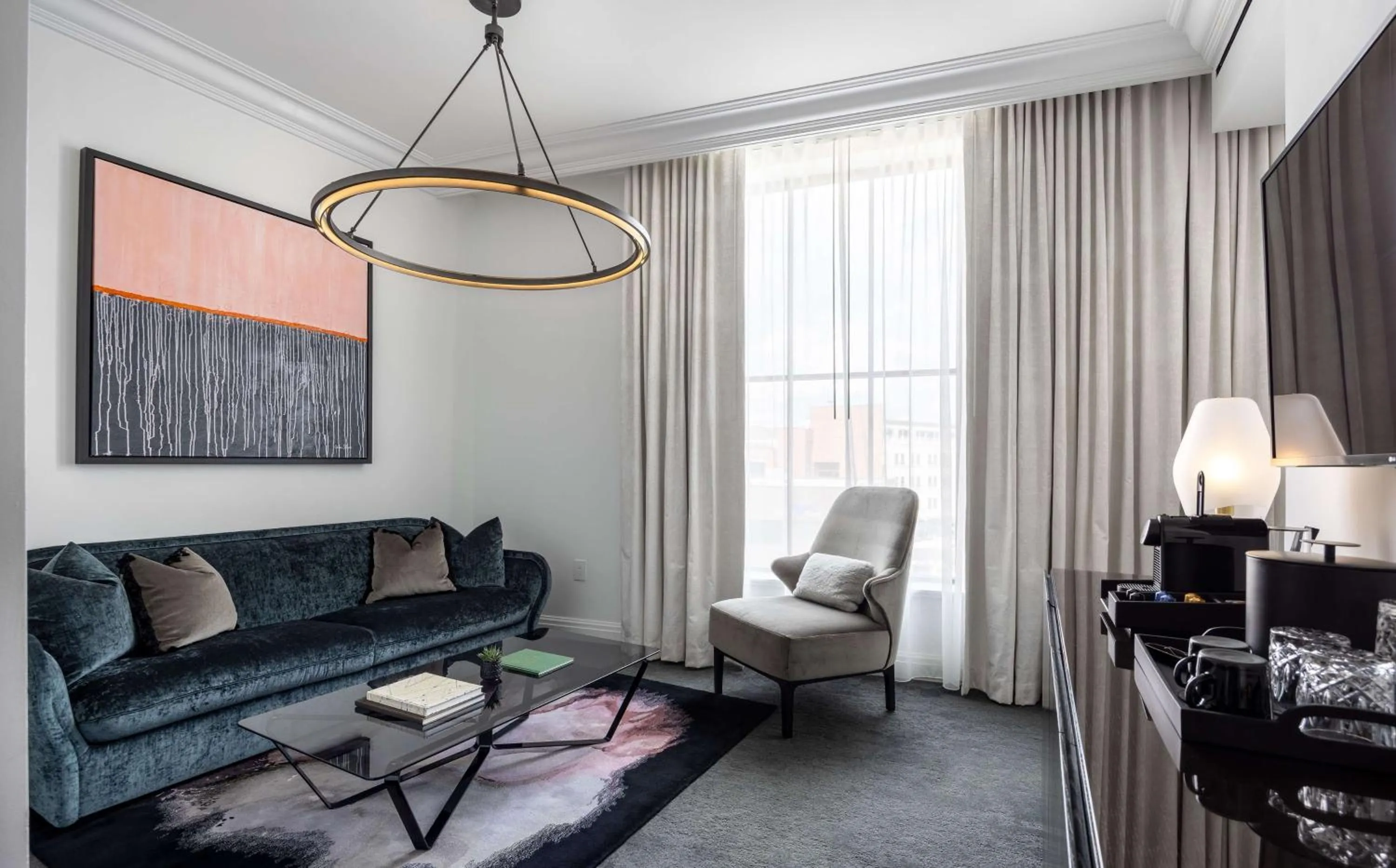 Living room in Daxton Hotel Birmingham, Curio Collection by Hilton