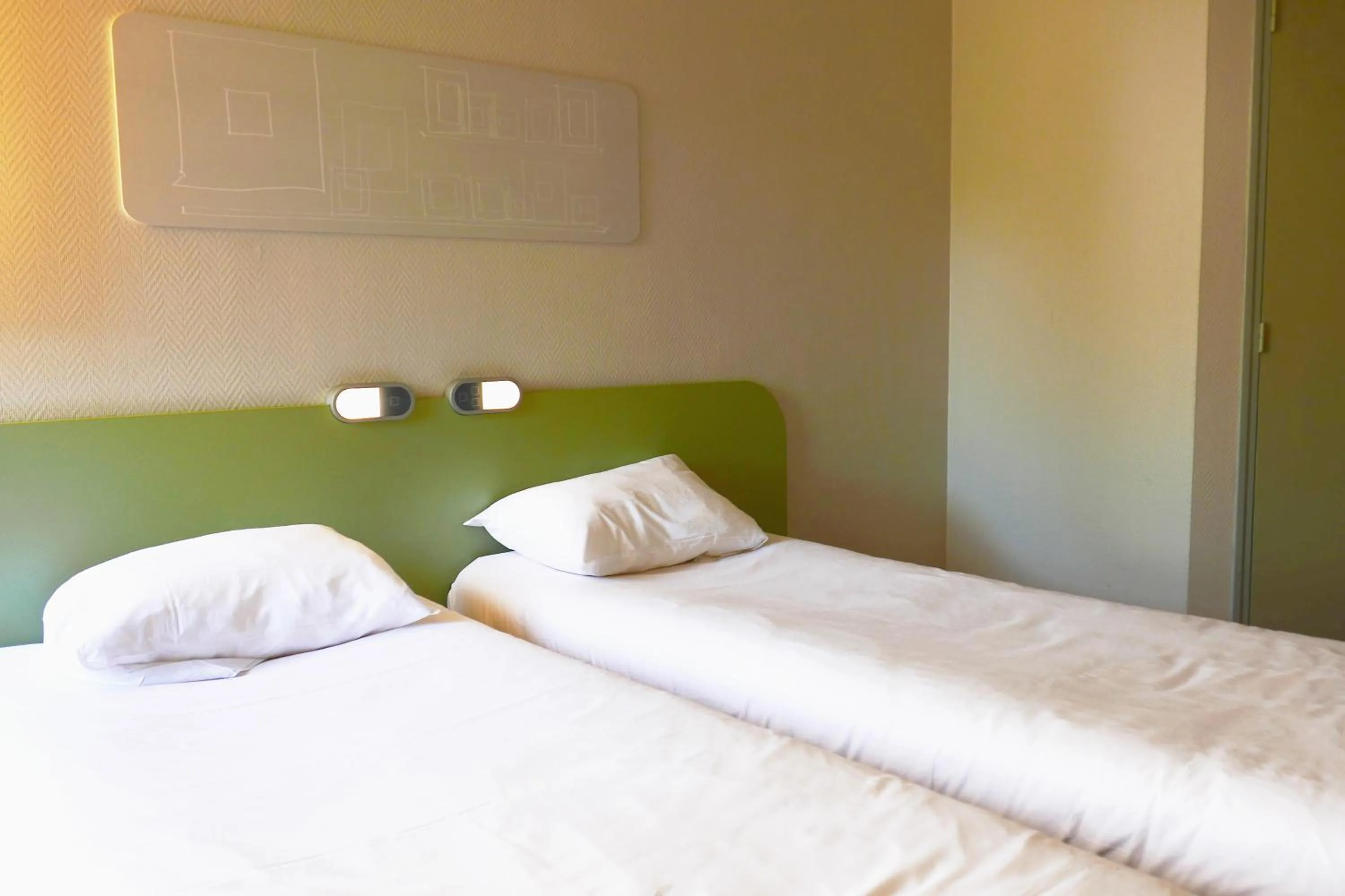 Bed in Hotel ibis Budget Laval