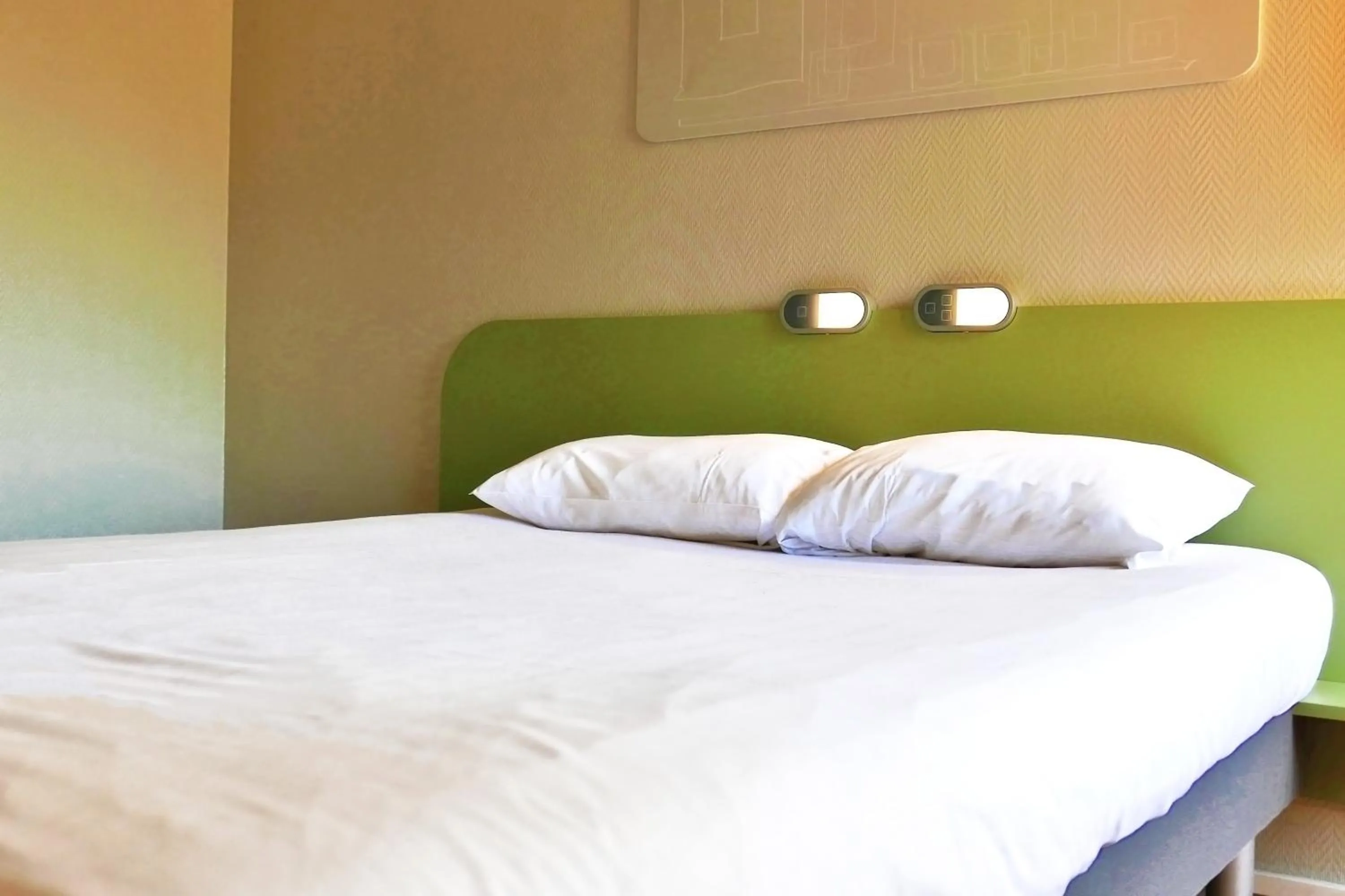 Bed in Hotel ibis Budget Laval