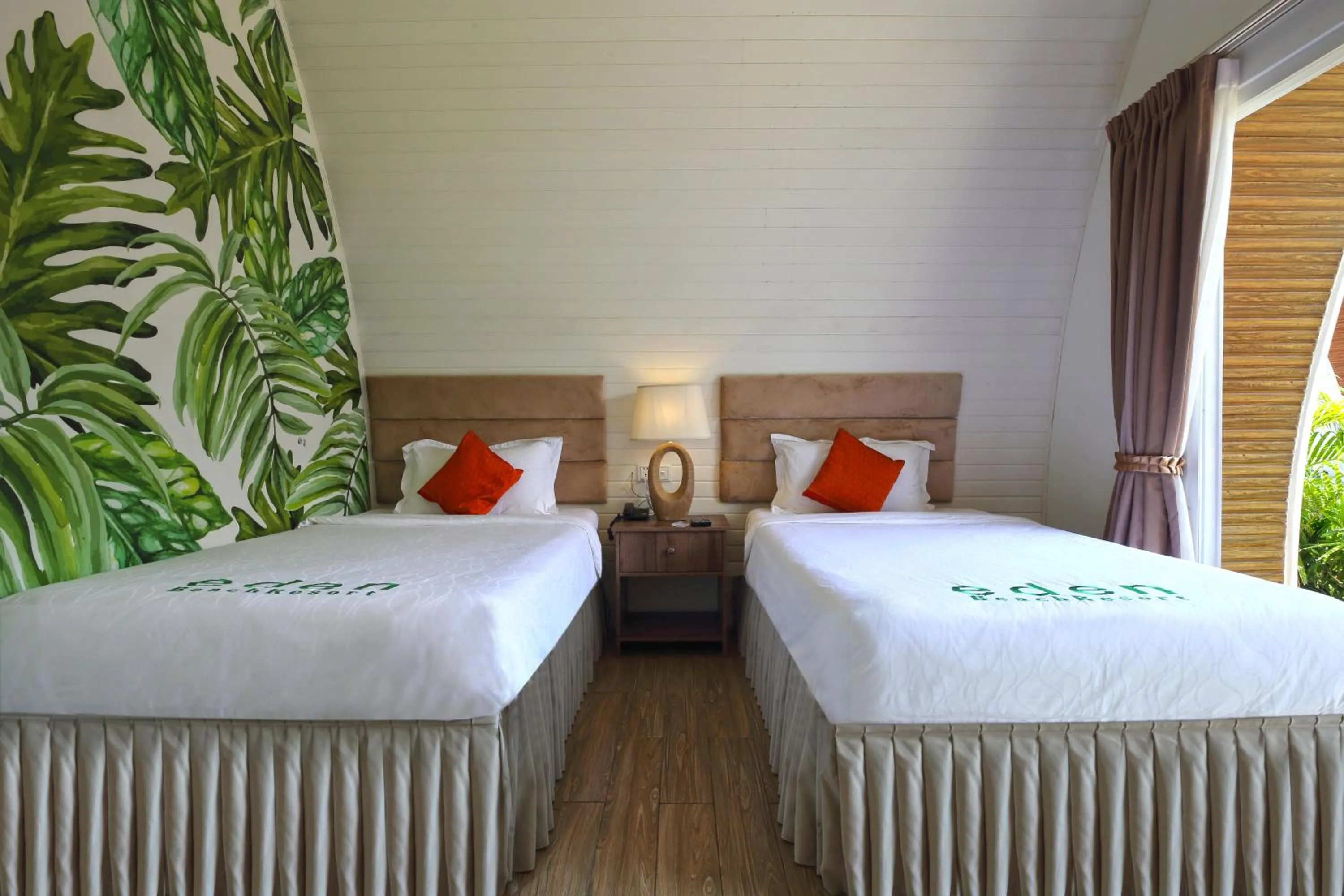 Bed in Eden Beach Resort by EHM