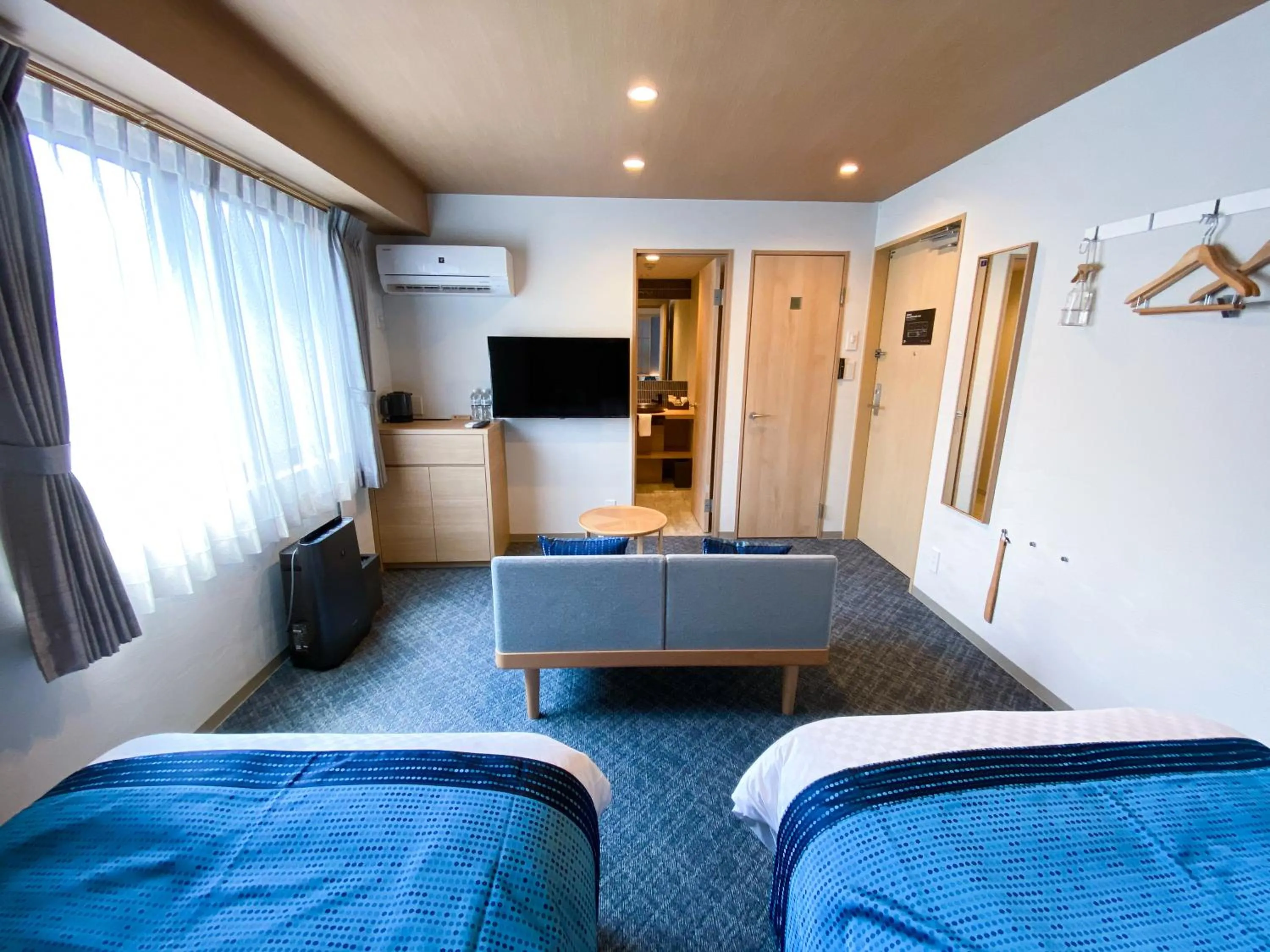 Photo of the whole room, Bed in Rinn Niomon