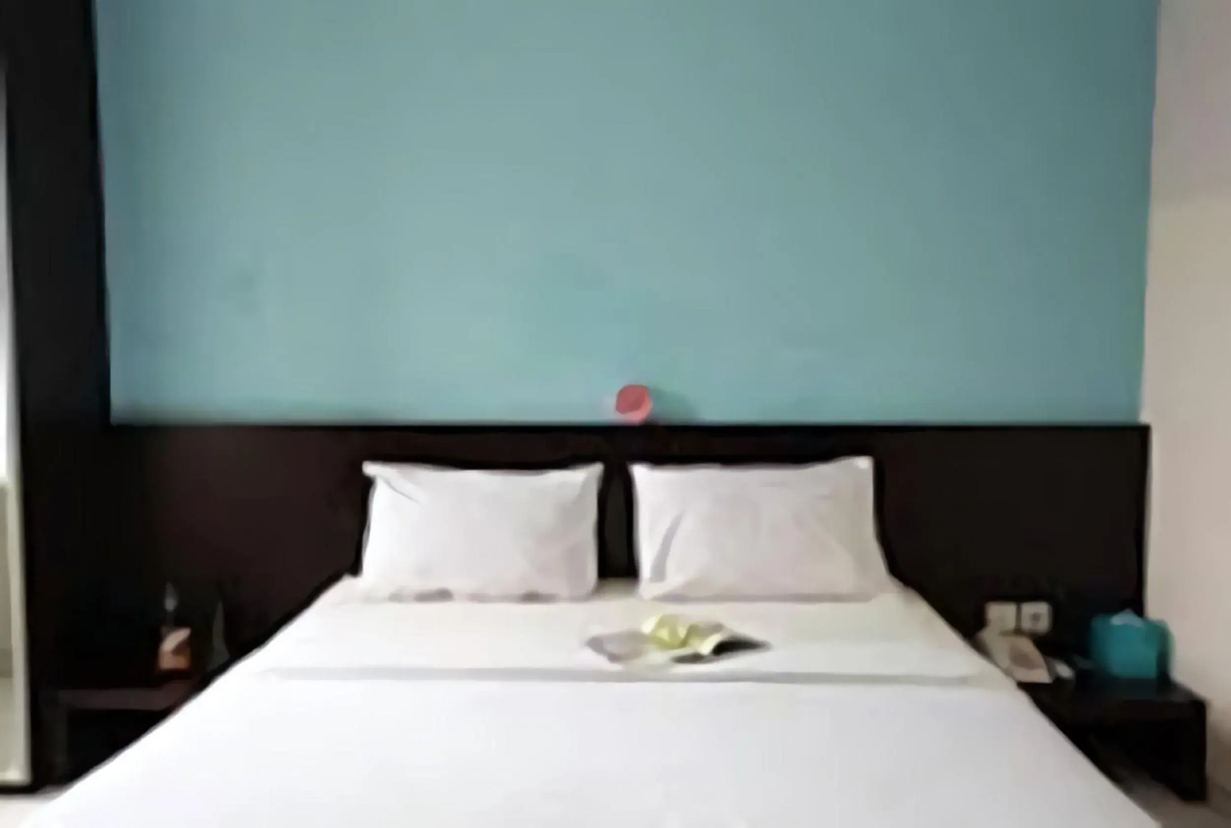 Bed in LeGreen Suite Ratulangi Bed in LeGreen Suite Ratulangi