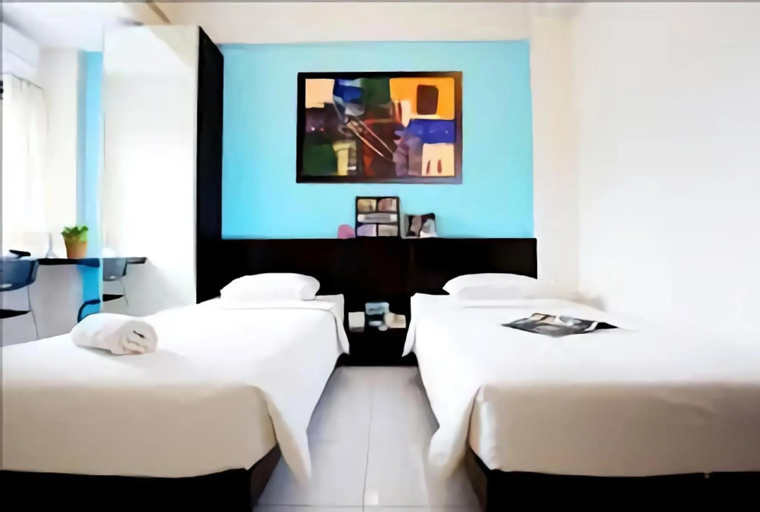 Bed in LeGreen Suite Ratulangi Bed in LeGreen Suite Ratulangi