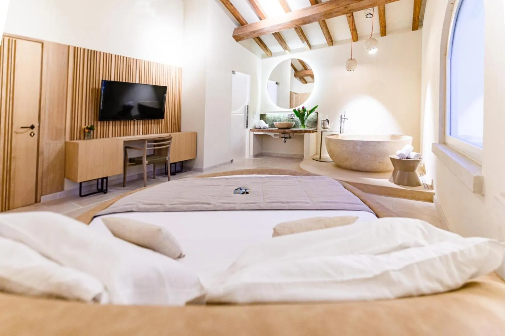 Bed in Pollicastro Boutique Hotel